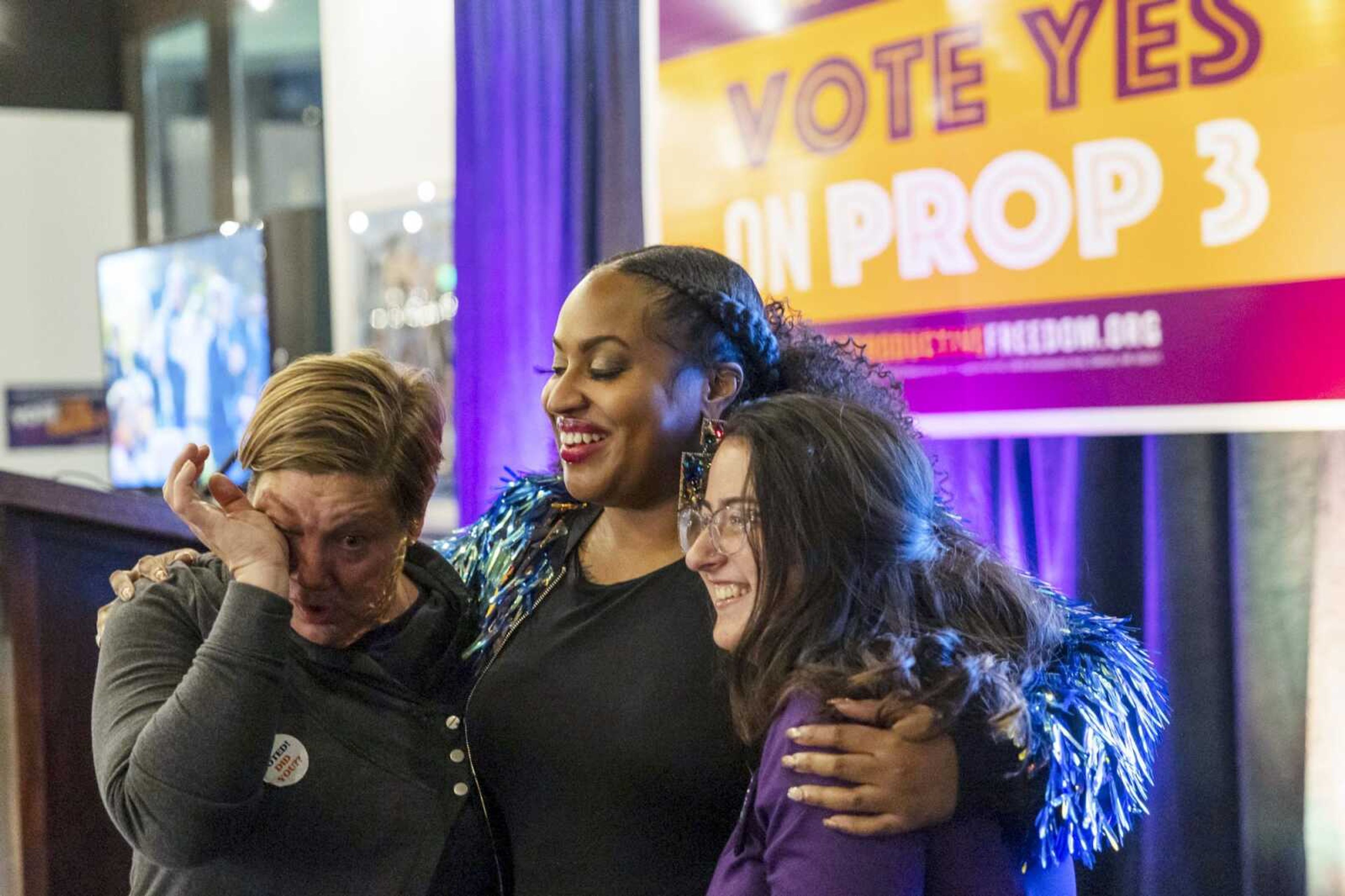 Supporters react as preliminary results come in for Michigan Proposal 3 on Election Day, Tuesday, Nov. 8, in Detroit, Michigan. Abortion rights supporters won in the four states where access was on the ballot Tuesday, as voters enshrined it into the state constitution in battleground Michigan as well as blue California and Vermont and dealt a defeat to an anti-abortion measure in deep-red Kentucky.