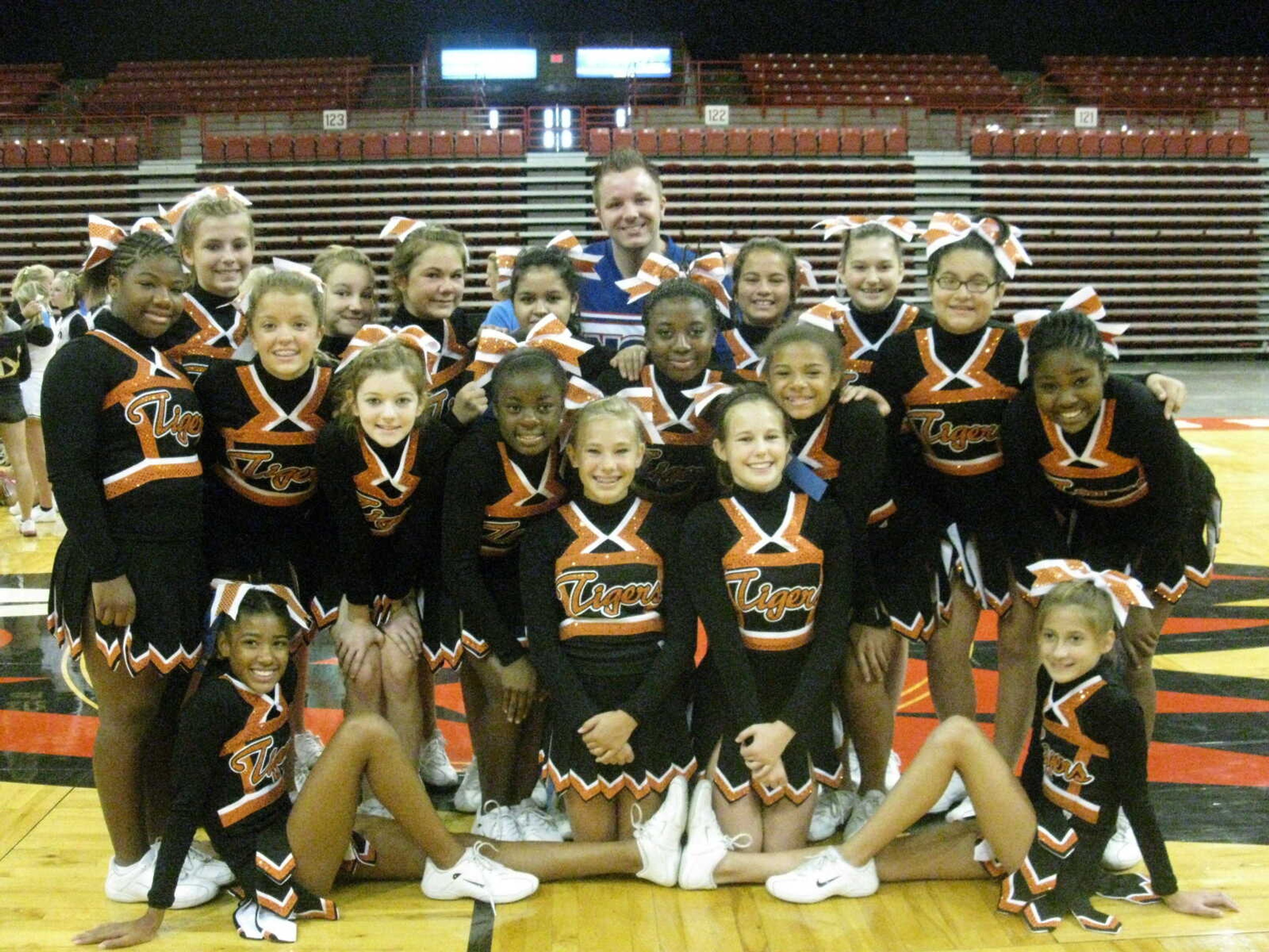 (pictured from left to right:  back row Hannah Elledge-Glueck, Shelby Wilkerson, Jayden Marra, Jackie Gonzalez,  Hanna Borders, Morgan Murphy, Betsy Gonzalez, Brooklyn Lintz.  middle row:  Alexis Jefferies, Ayanna Askew, Jonnie Ann Daniels, Courterra Stevenson, Deja Reddin, Mackenzie Mitchell. kneeling Bella Sander (co-captain) and Riley Knight (co-captain). sitting Sierra Jones (captain) and Amanda Evans (captain).  Squad is coached by Laura Matlock and Jessica Grandcolas (not pictured)NCA instructor pictured in back.