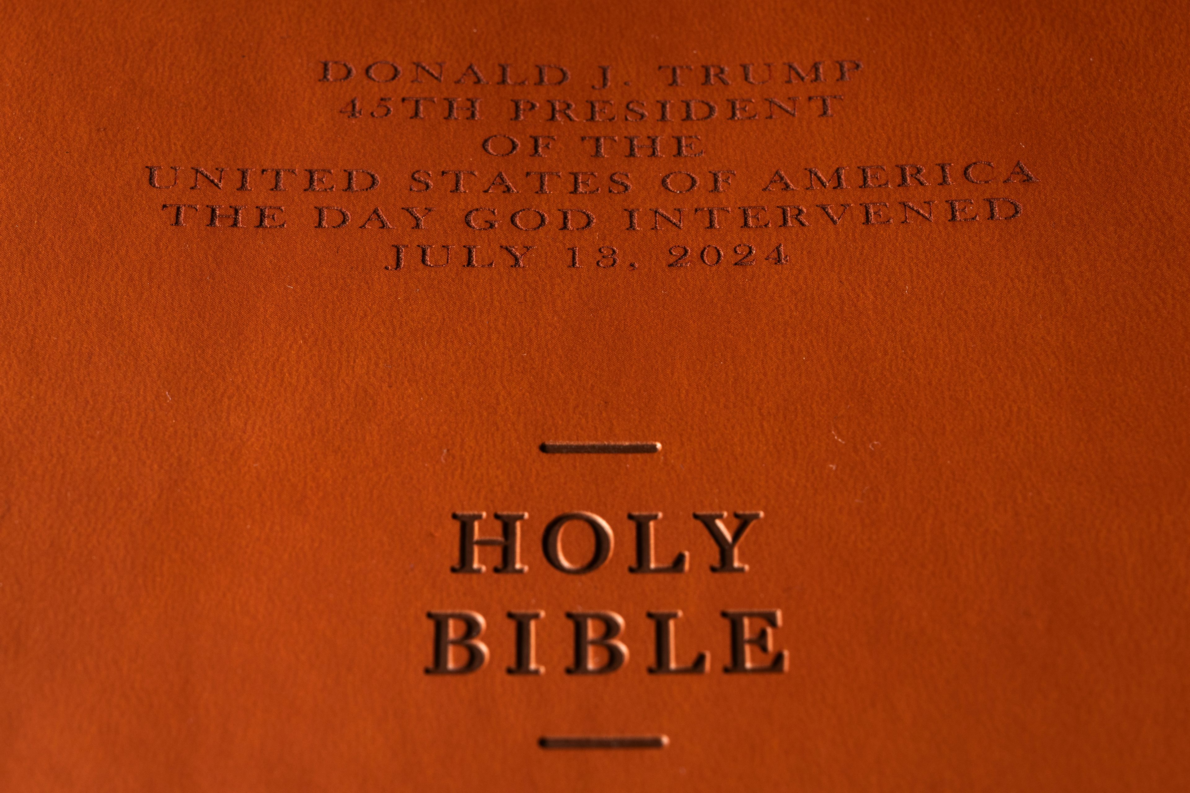 The front cover of Republican presidential nominee former President Donald Trump's "God Bless the USA" Bible in Washington, Tuesday, Oct. 8, 2024. (AP Photo/Ben Curtis)