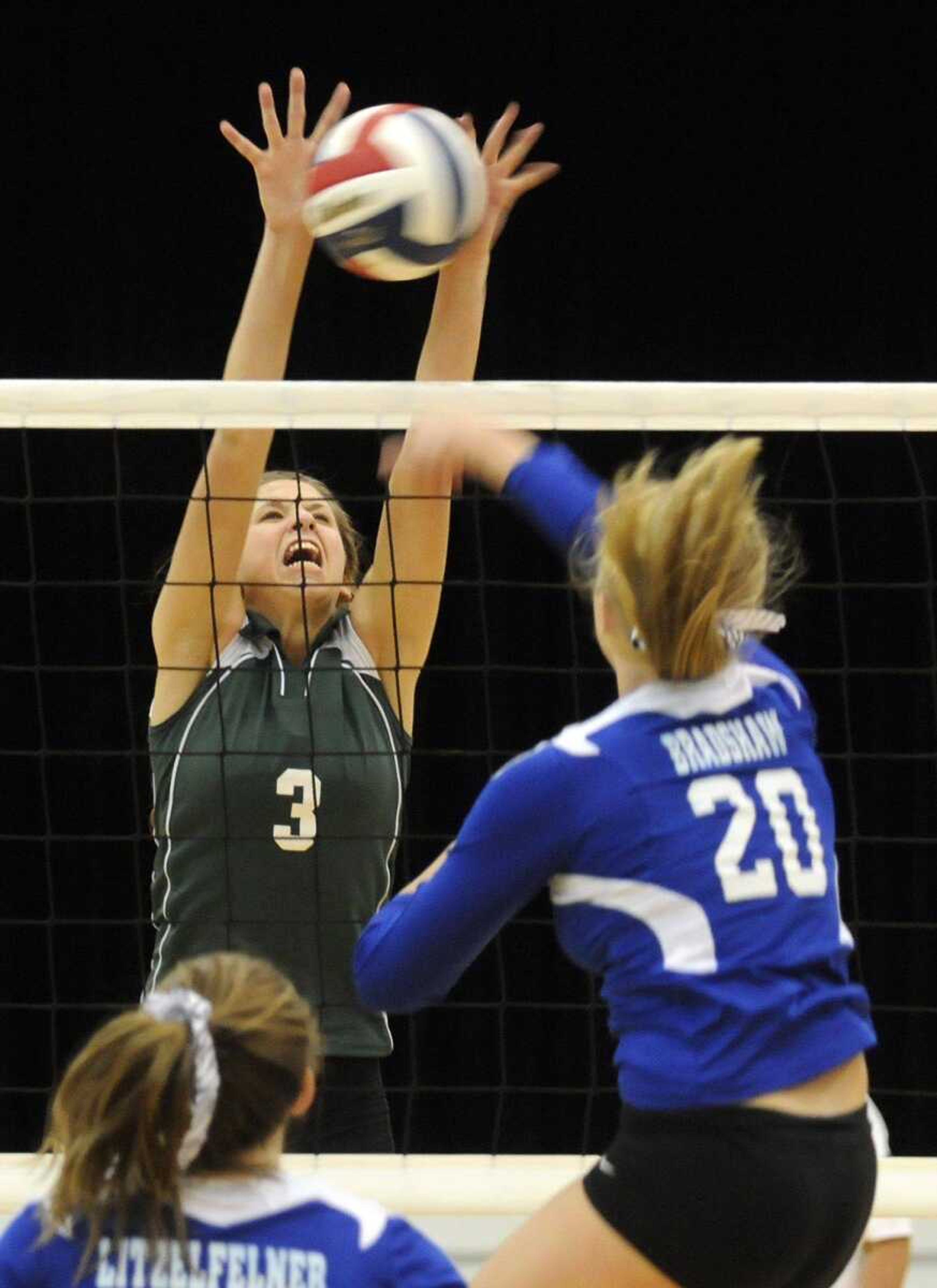 Perryville's Natalie Gremaud goes up for a block against Notre Dame's Allyson Bradshaw during Game 2 of the Class 3 District 1 title match Tuesday in Dexter, Mo. Notre Dame won 2-0. (KRISTIN EBERTS ~ keberts@semissourian)