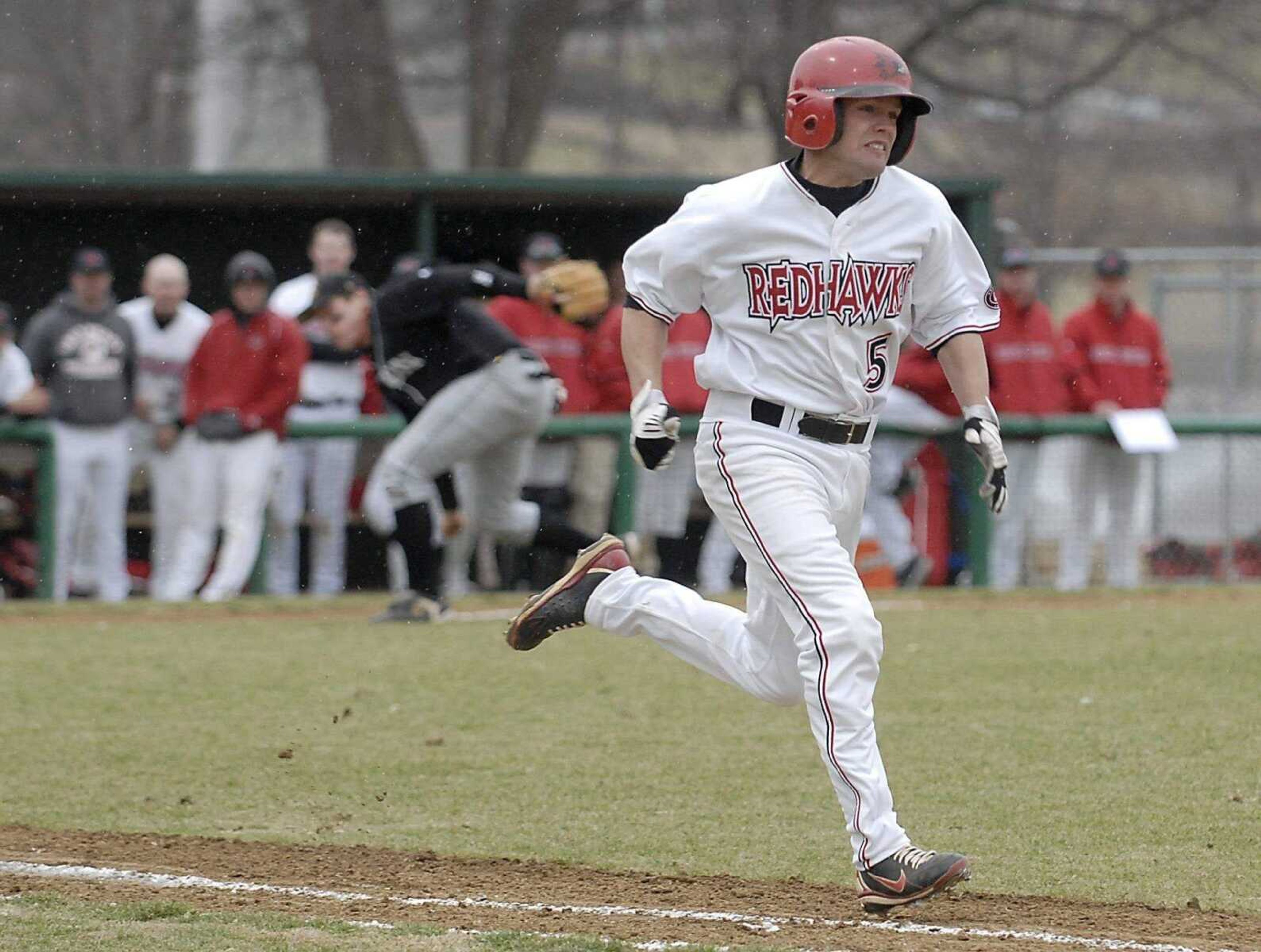 KIT DOYLE ~ kdoyle@semissourian.comSoutheast Missouri State senior Tony Spencer bunts for a single during a recent game at Capaha Field. While being the shortest player on the team, Spencer leads the Redhawks' starters with a .426 batting average.