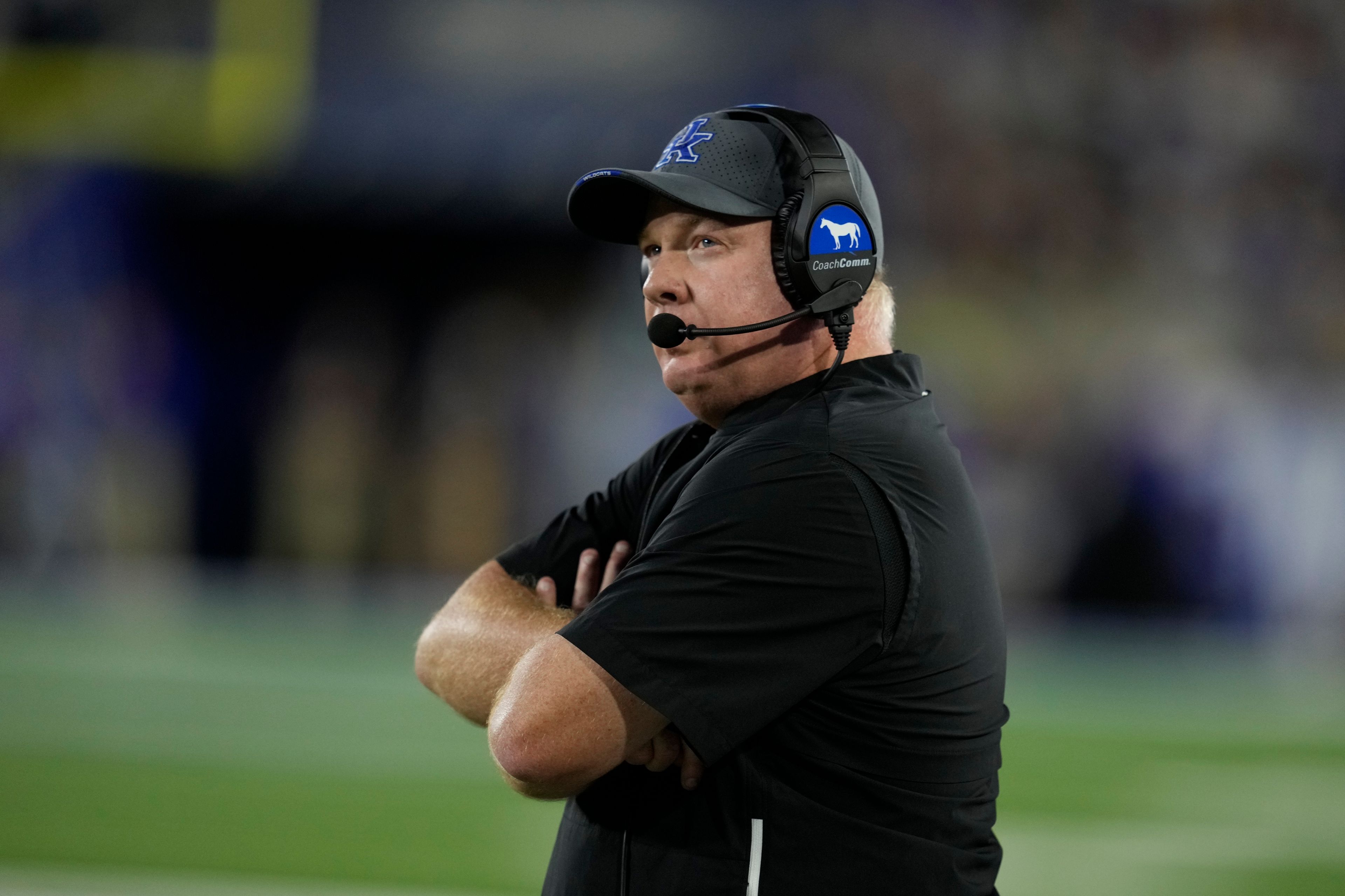 FILE - Kentucky head coach Mark Stoops watches during the second half of an NCAA college football game against Georgia, Saturday, Sept. 14, 2024, in Lexington, Ky. (AP Photo/Darron Cummings, File)