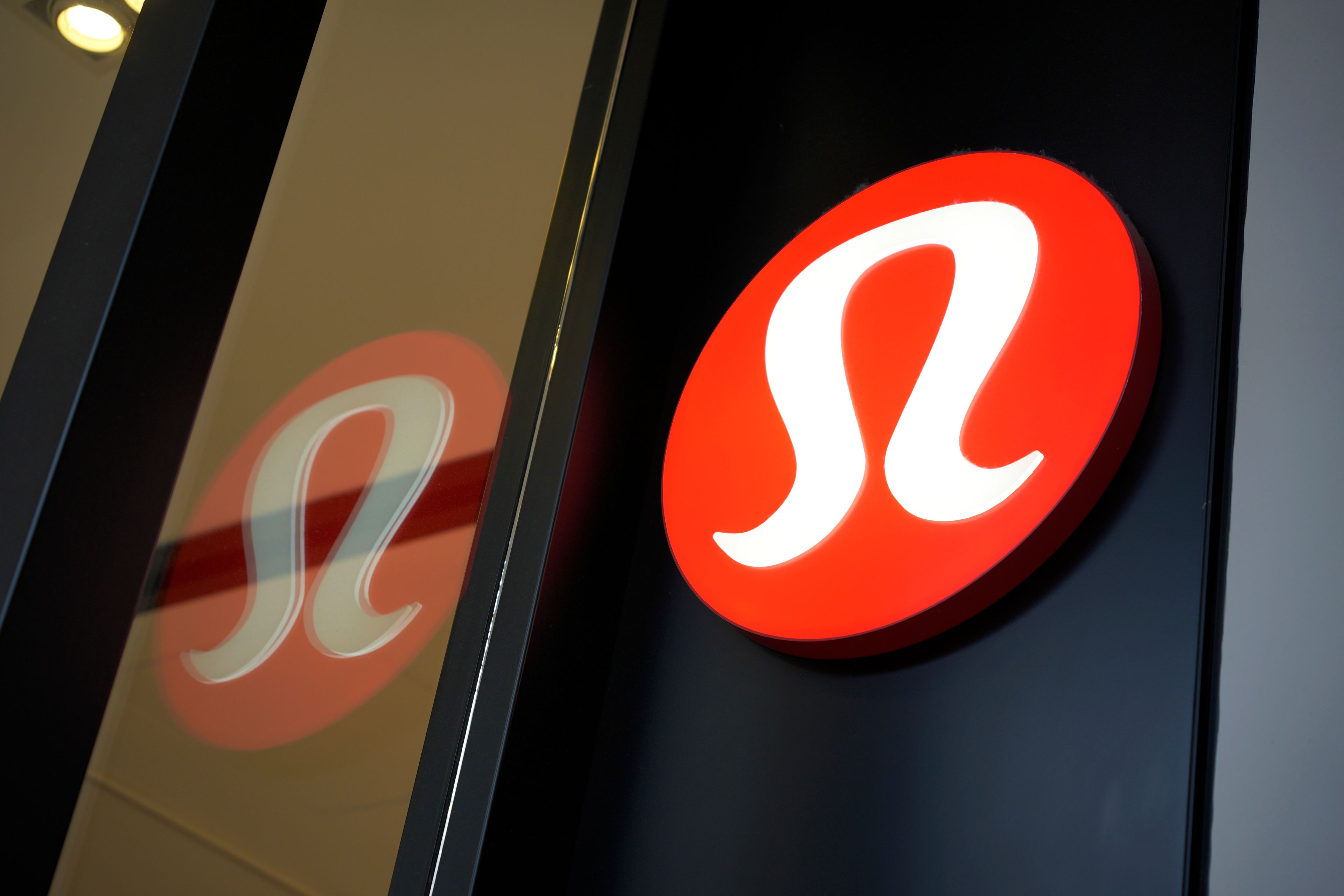 FILE - The Lululemon logo is displayed on a Lululemon store in Pittsburgh, June 3, 2024. (AP Photo/Gene J. Puskar)