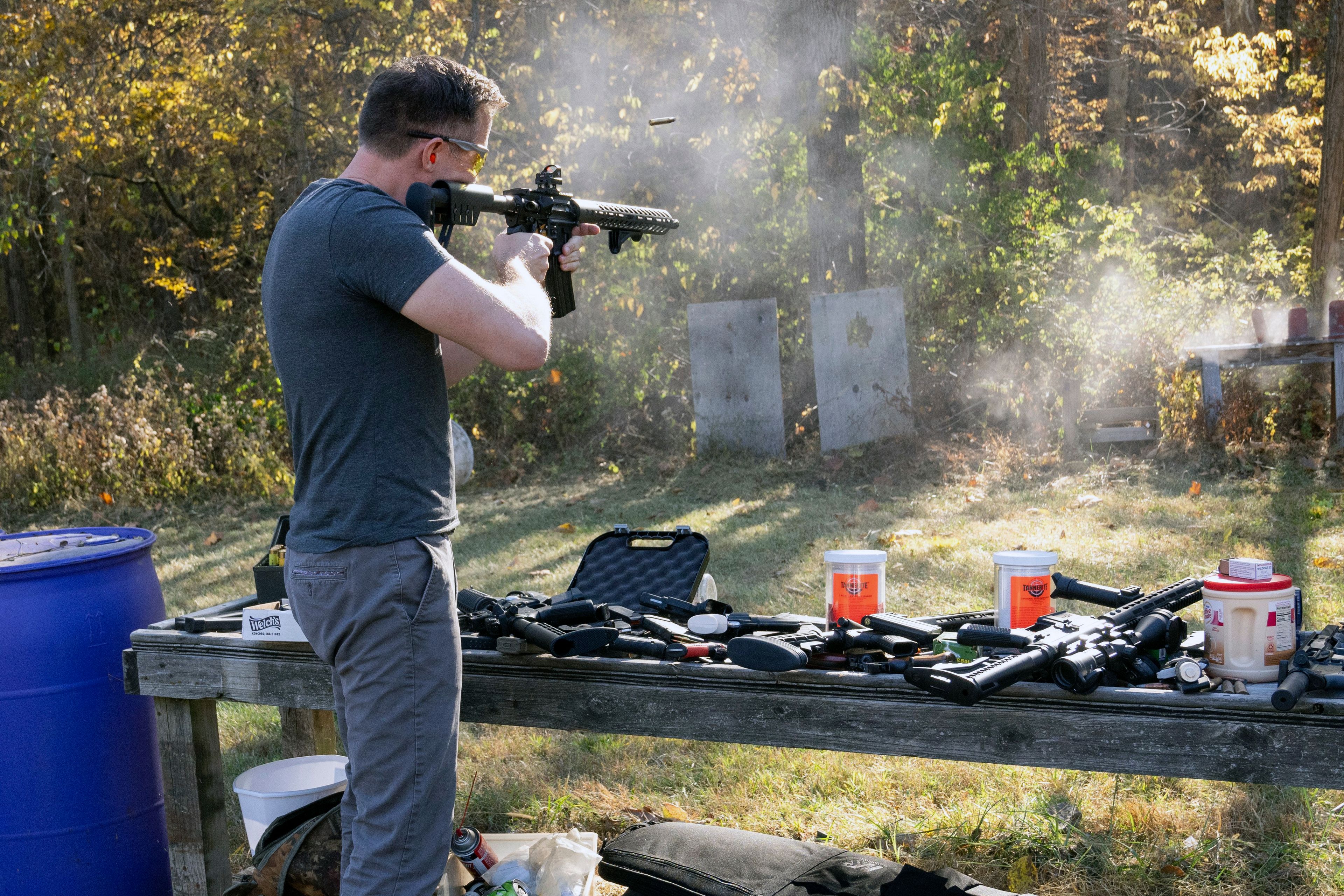 Missouri Democratic U.S. senate candidate Lucas Kunce fires rounds from a AR-15-style rifle during a campaign event Tuesday, Oct. 22, 2024 in Holt, Missouri. (Dominick Williams/The Kansas City Star via AP)