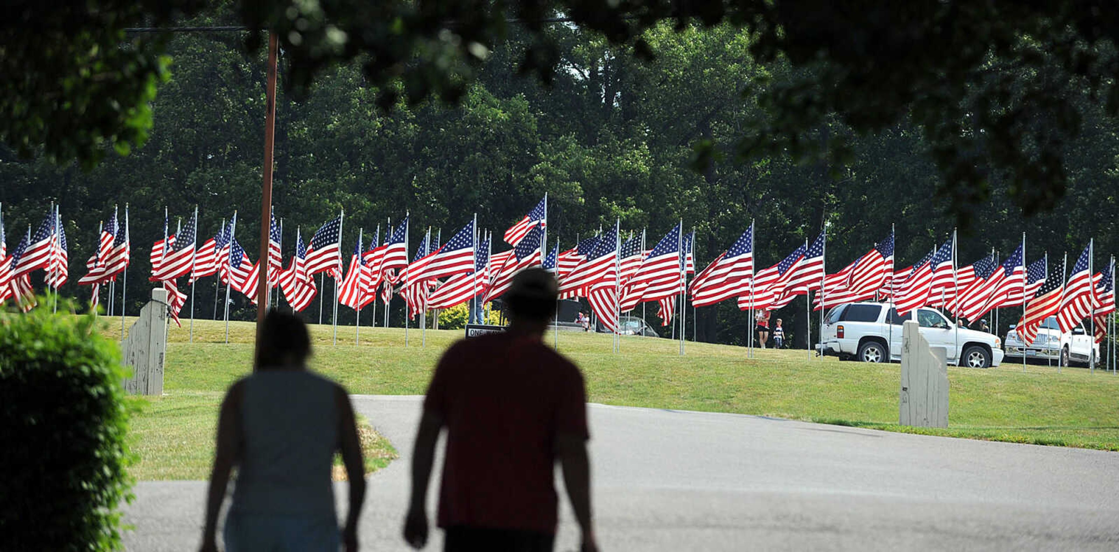 LAURA SIMON ~ lsimon@semissourian.com
The Avenue of Flags lines the horizon as seen from Cape County Park South Monday, May 28, 2012.