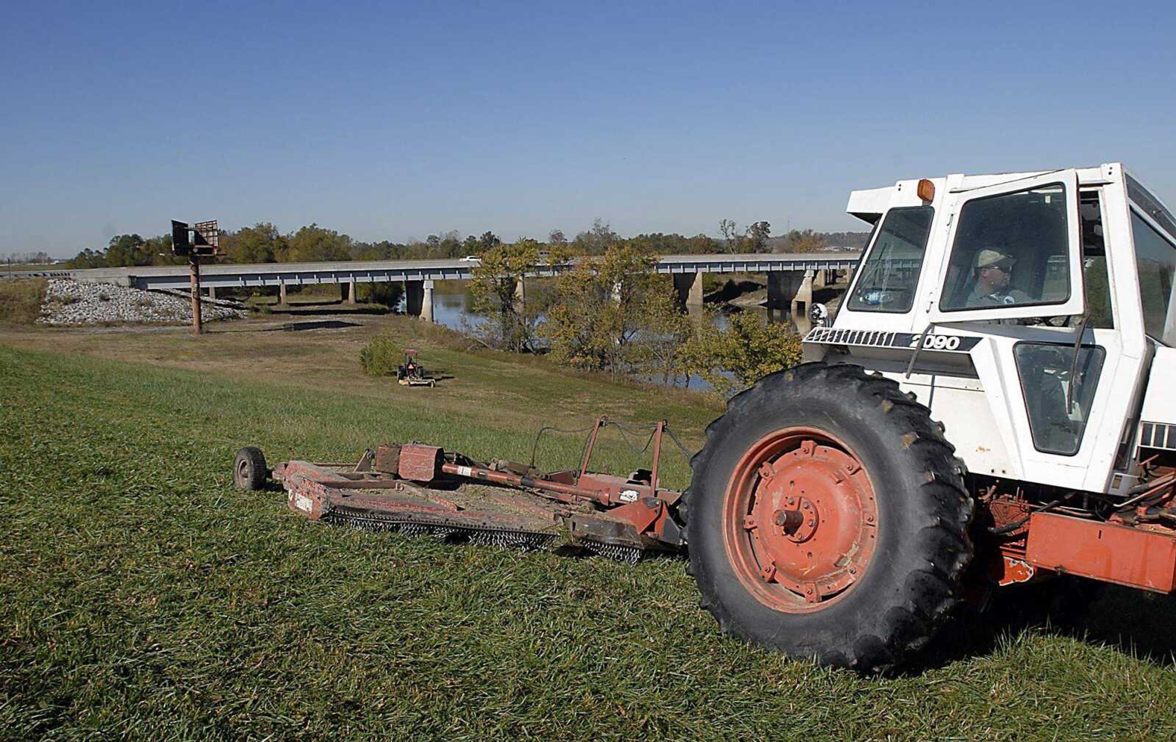 Josh McClelland mowed the levee south of the Diversion Channel on Friday as part of general maintenance for the Little River Drainage District. Most area watersheds south of the Diversion Channel feed into the Little River Drainage District.