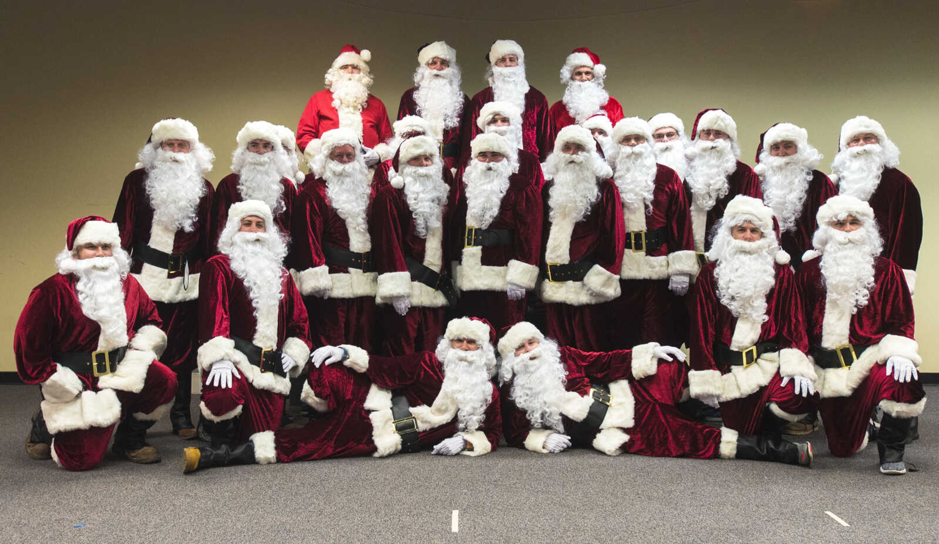 A group of Santa's get their picture taken during the Jaycee Toybox delivery on Thursday, Dec. 21, 2017, in Cape Girardeau.