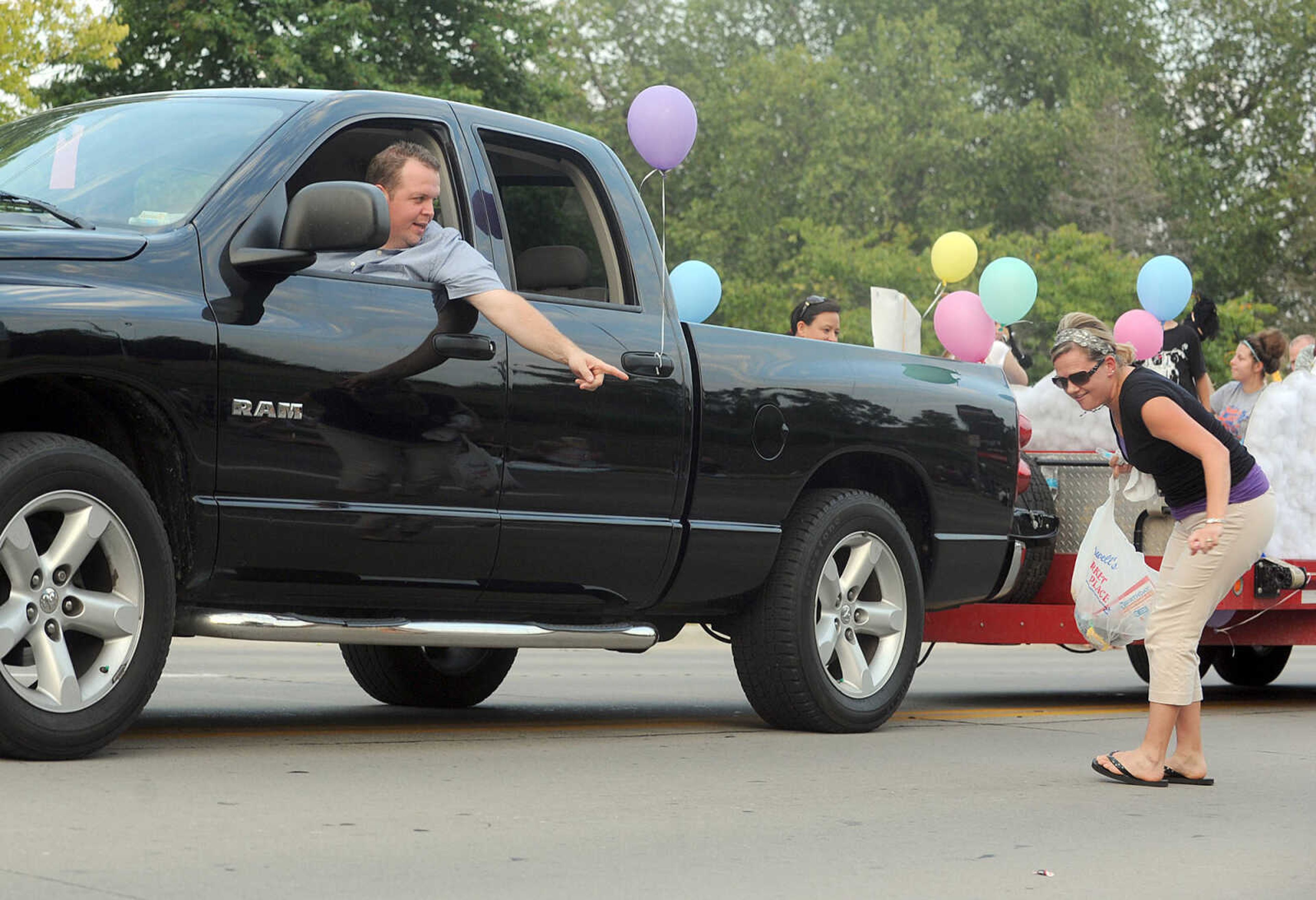 LAURA SIMON ~ lsimon@semissourian.com

The SEMO District Fair Parade moves along Broadway towards Arena Park, Monday, Sept. 9, 2013, in Cape Girardeau.