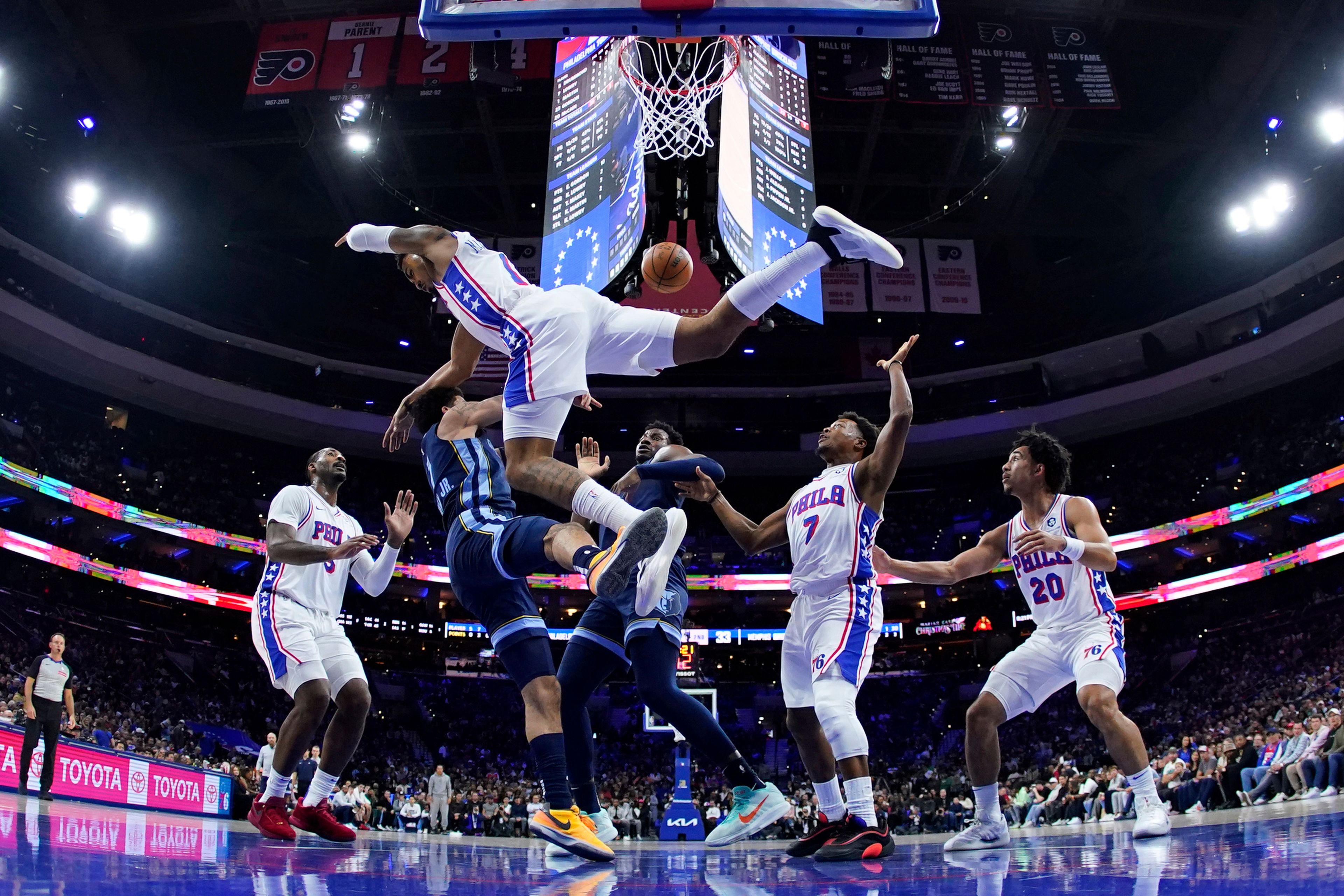 Memphis Grizzlies' Scotty Pippen Jr., left, and Philadelphia 76ers' KJ Martin collide during the first half of an NBA basketball game, Saturday, Nov. 2, 2024, in Philadelphia. (AP Photo/Matt Slocum)