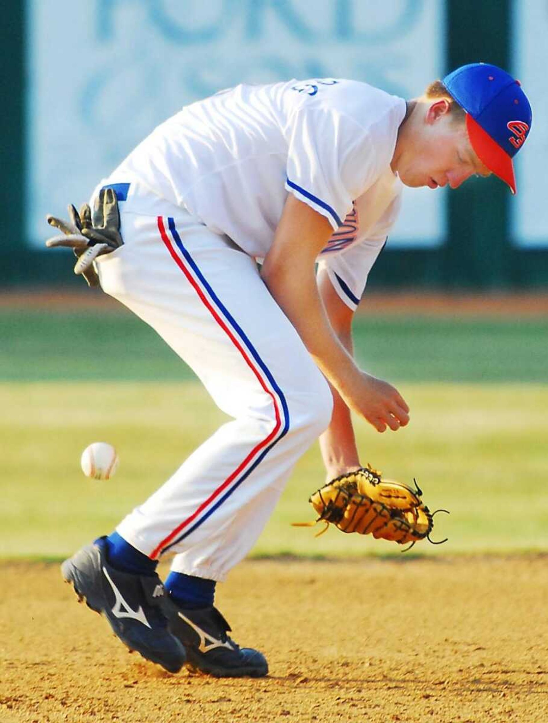 Cape shortstop Mark Himmelberg fumbled a ground ball but recoverd it in time to get the out at first base during the third inning Wednesday at Capaha Field. (AARON EISENHAUER ~aeisenhauer@semissourian.com)