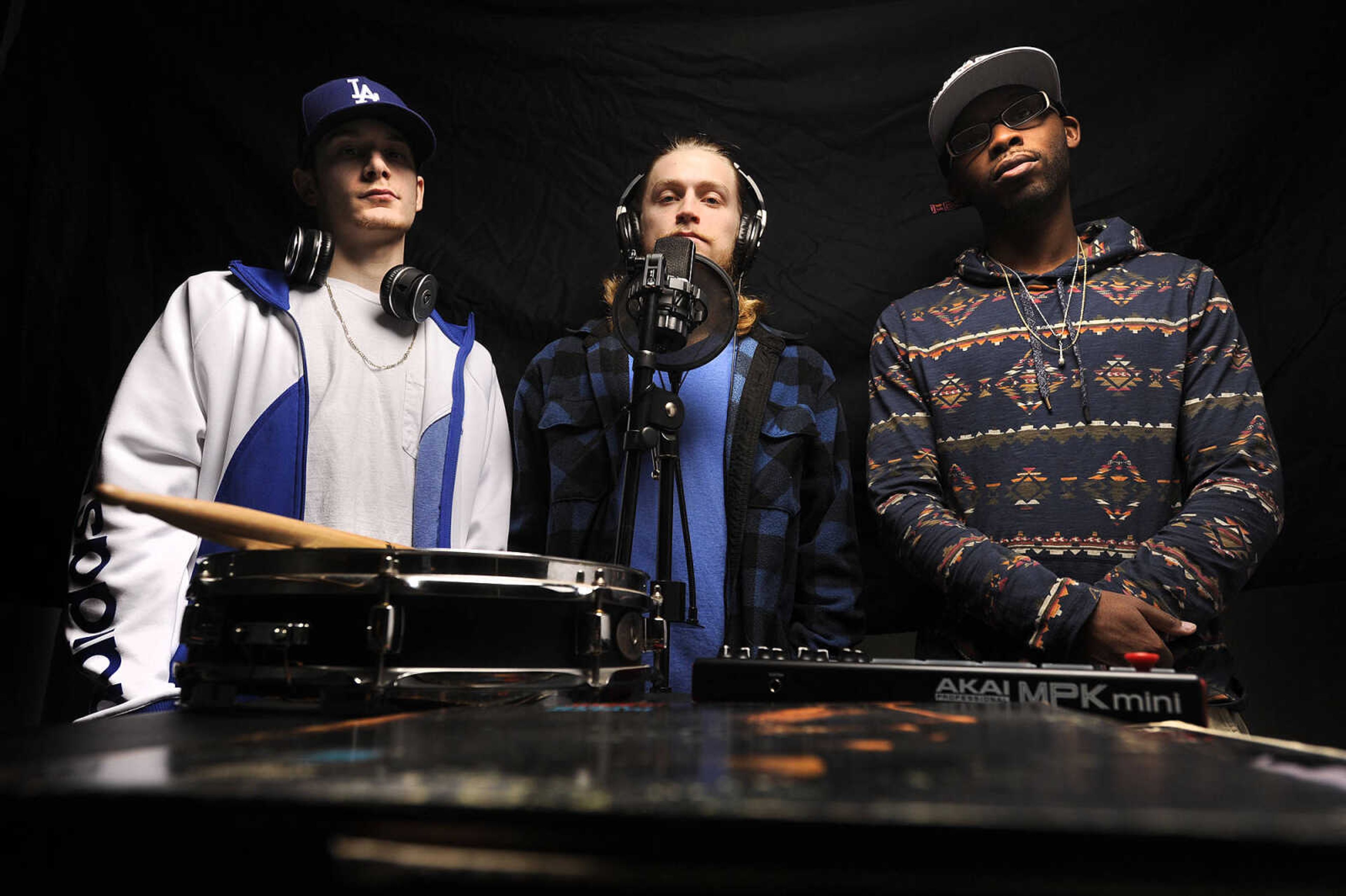 LAURA SIMON ~ lsimon@semissourian.com

Nik " Niko Scarpy" Scarpaci, left, Angelo "Gelo" Wilson, center, and Amir "Amirical"  Waters of hip hop group Imaginary Friends, pose for a photo, Wednesday, Jan. 27, 2016.