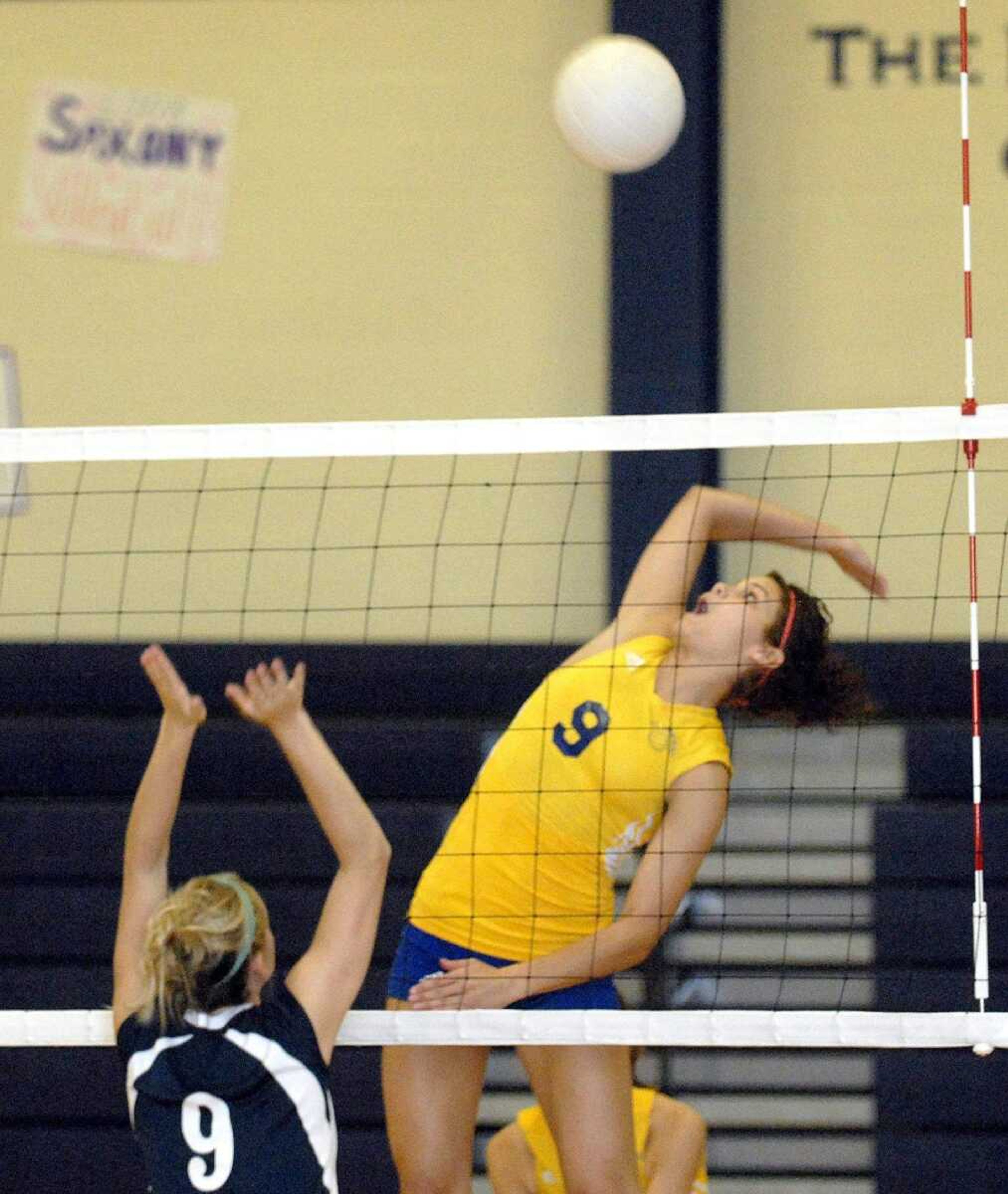 Photo by Josh Buchheit
St. Vincent's Courtney Besand attempts a kill against Saxony's Kari Hadler. St. Vincent defeated Saxony 2-0.