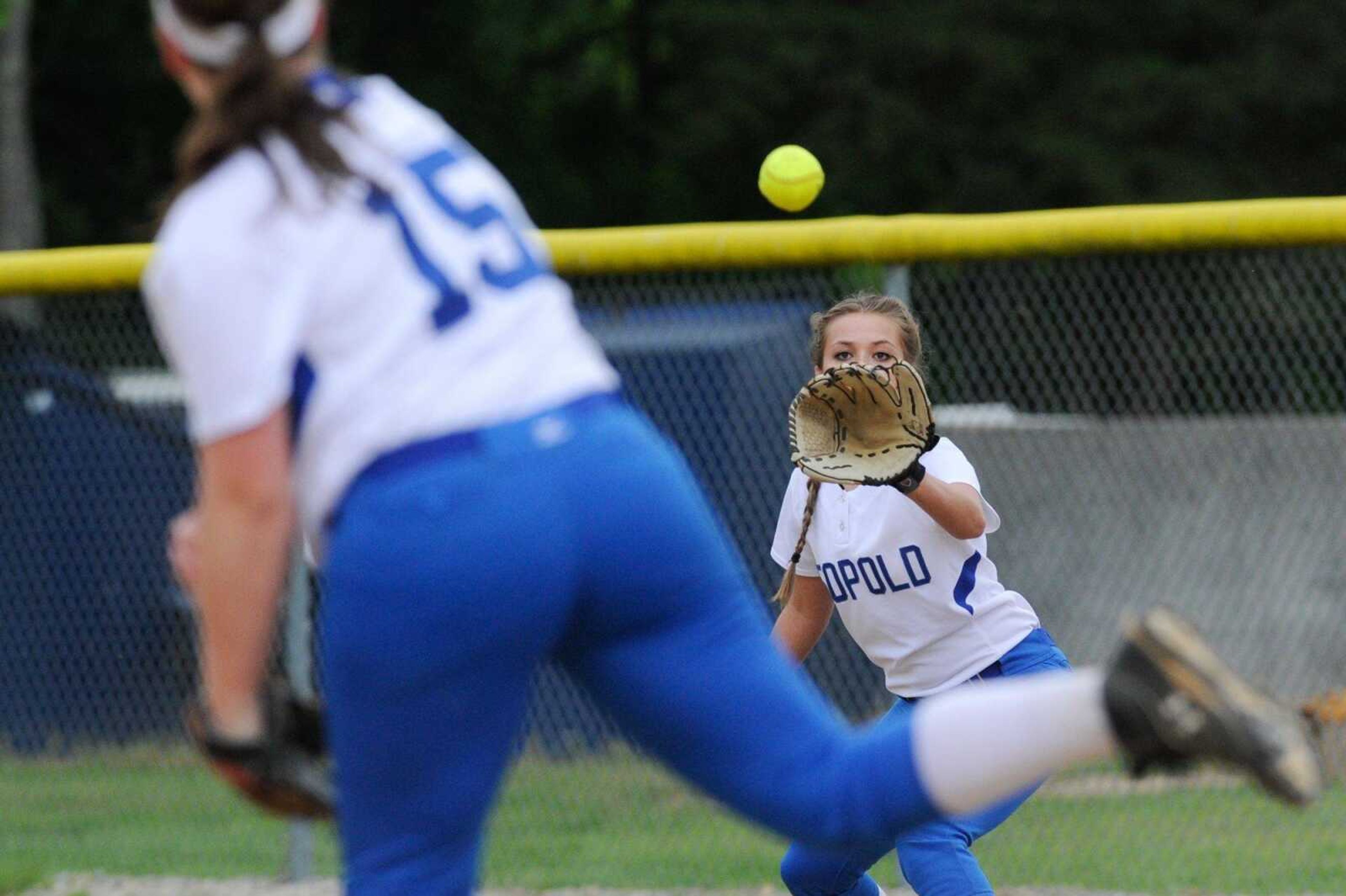 Leopold's Alexis Vandeven makes the throw to Emily Seiler at first base for an out against Oran in the fourth inning during a Class 1 District 4 semifinal Tuesday, May 3, 2016 in Marble Hill, Missouri.