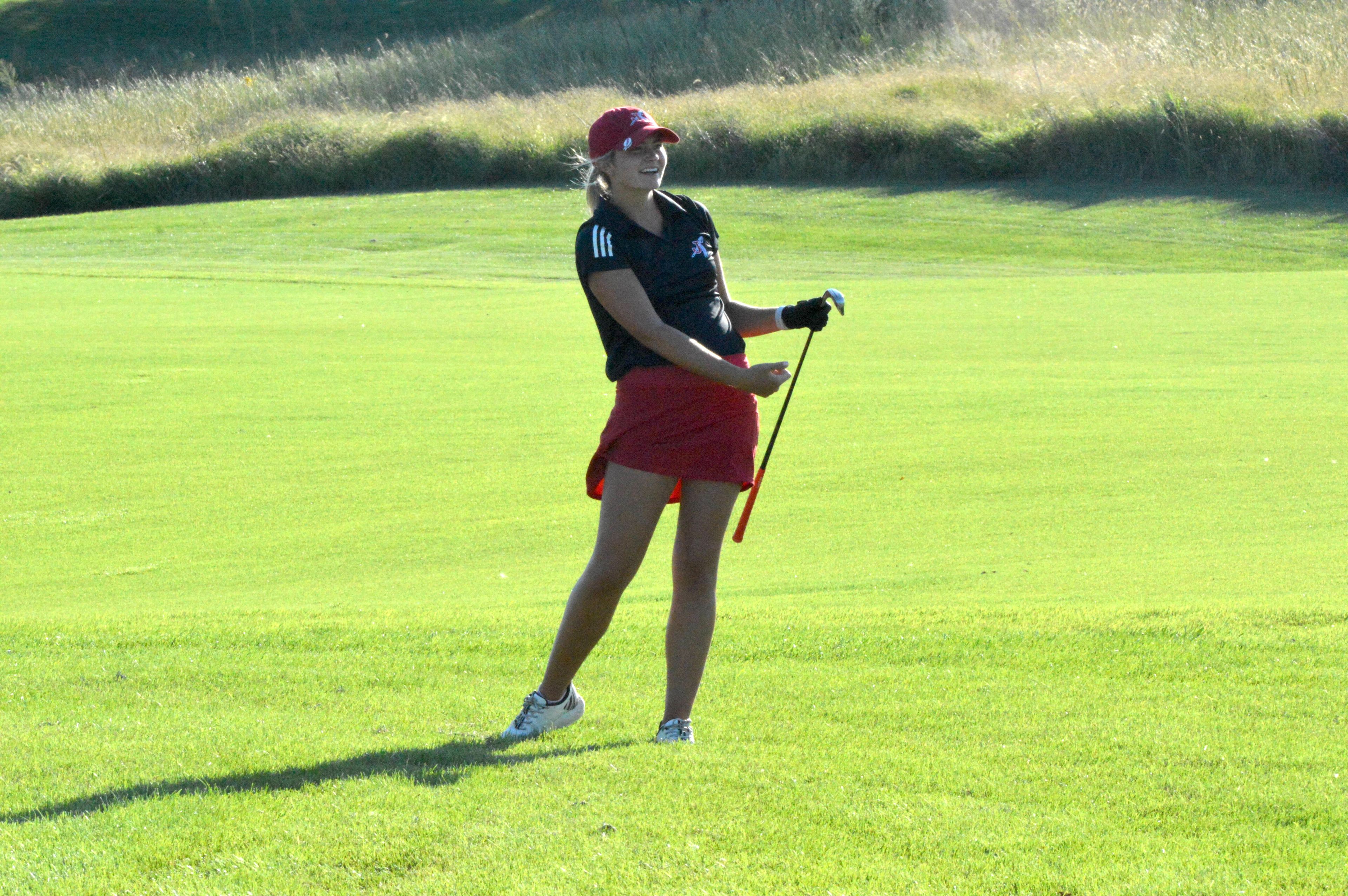 Jackson's Julia Schlitt smiles after her shot in the Notre Dame quad-meet on Thursday, Sept. 26. 