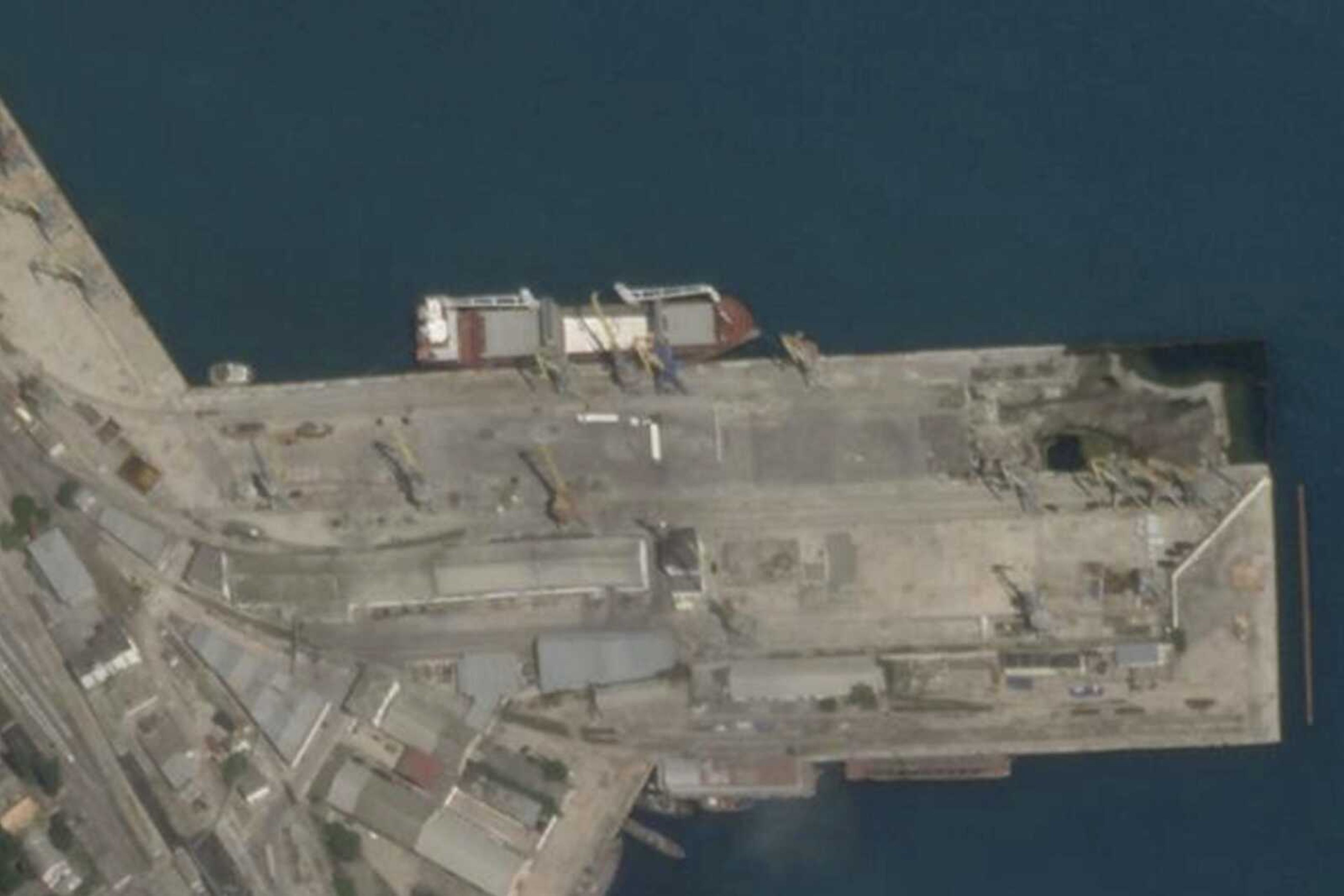 The cargo ship Laodicea is docked at a port in Feodosia, Crimea, on July 11. Two weeks later, when it arrived at the Lebanese port city Tripoli, a manifest falsely claimed the barley and wheat flour in its hold was loaded at a small Russian port on the other side of the Black Sea.