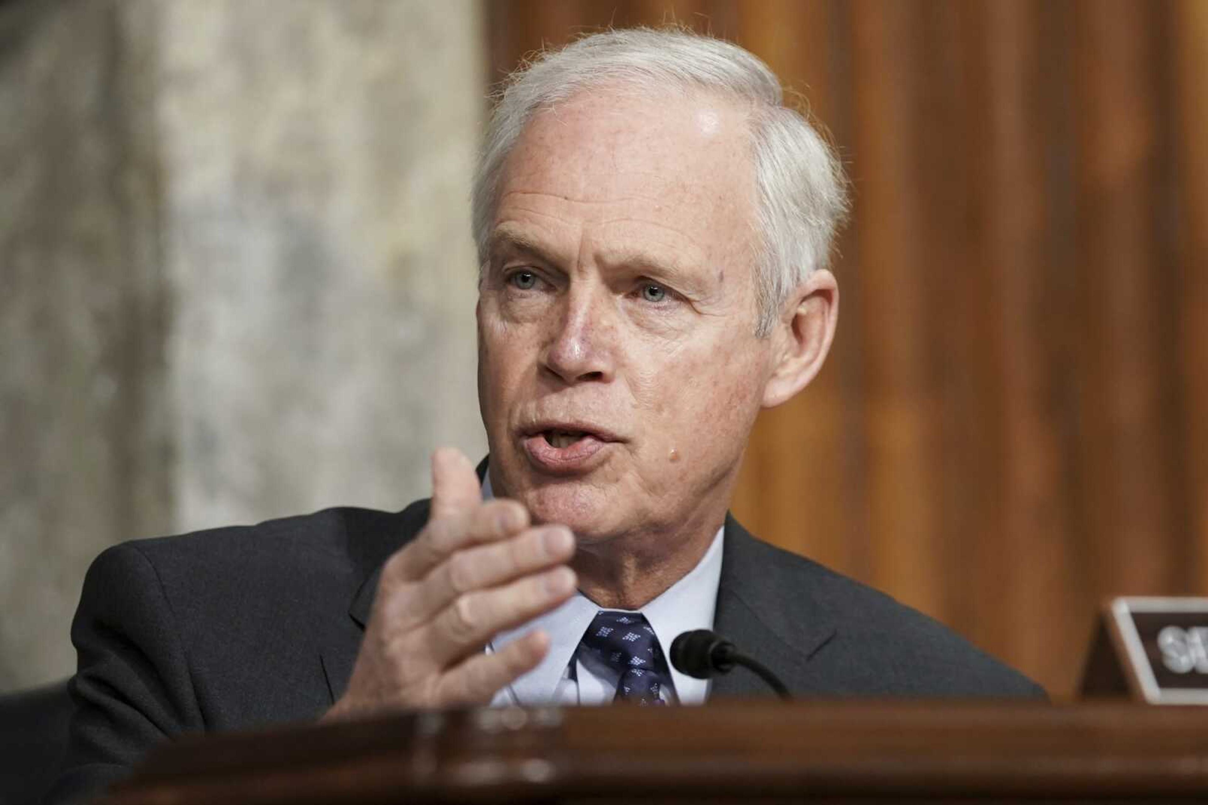 FILE - In this March 3, 2021 file photo, Sen. Ron Johnson, R-Wis., speaks at the U.S. Capitol in Washington.  Johnson, questioned the need for widespread COVID-19 vaccinations, saying in a radio interview  what do you care if your neighbor has one or not?  Johnson, who has no medical expertise or background, made the comments Thursday, April 22, during an interview with conservative talk radio host Vicki McKenna. (Greg Nash/Pool via AP, File)