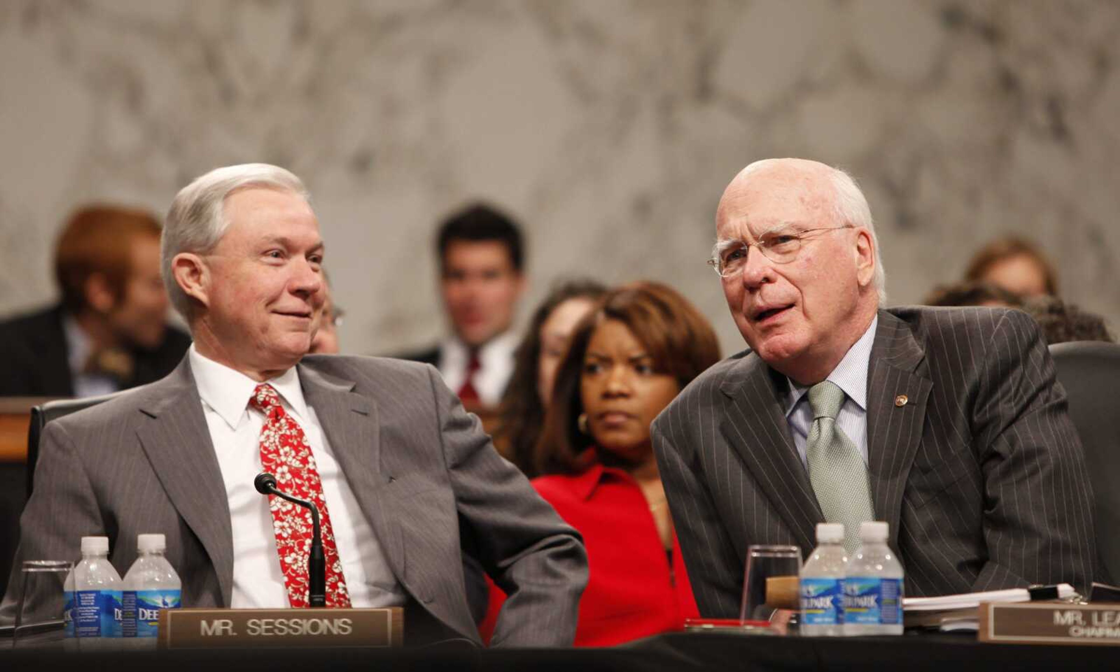 Senate Judiciary chairman, Sen. Pat Leahy, D-Vt., right, takes his seat with Sen. Jeff Sessions, R-Ala., as they meet Tuesday on Capitol Hill in Washington. (Gerald Herbert ~ Associated Press)