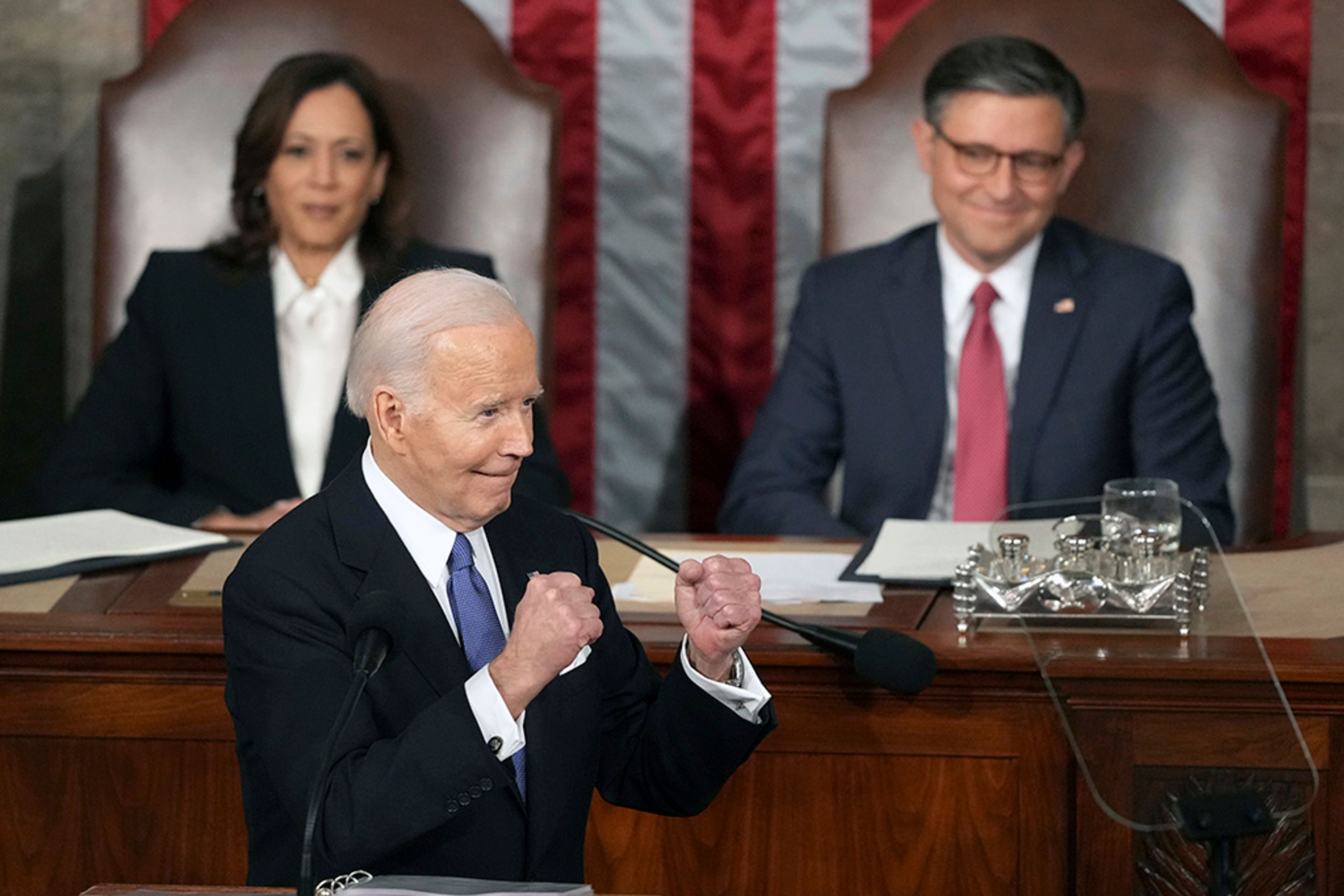 President Joe Biden gestures to Republicans as Vice President Kamala Harris and House Speaker Mike Johnson of La., watch during the State of the Union address to a joint session of Congress at the U.S. Capitol, Thursday March 7, 2024, in Washington. 