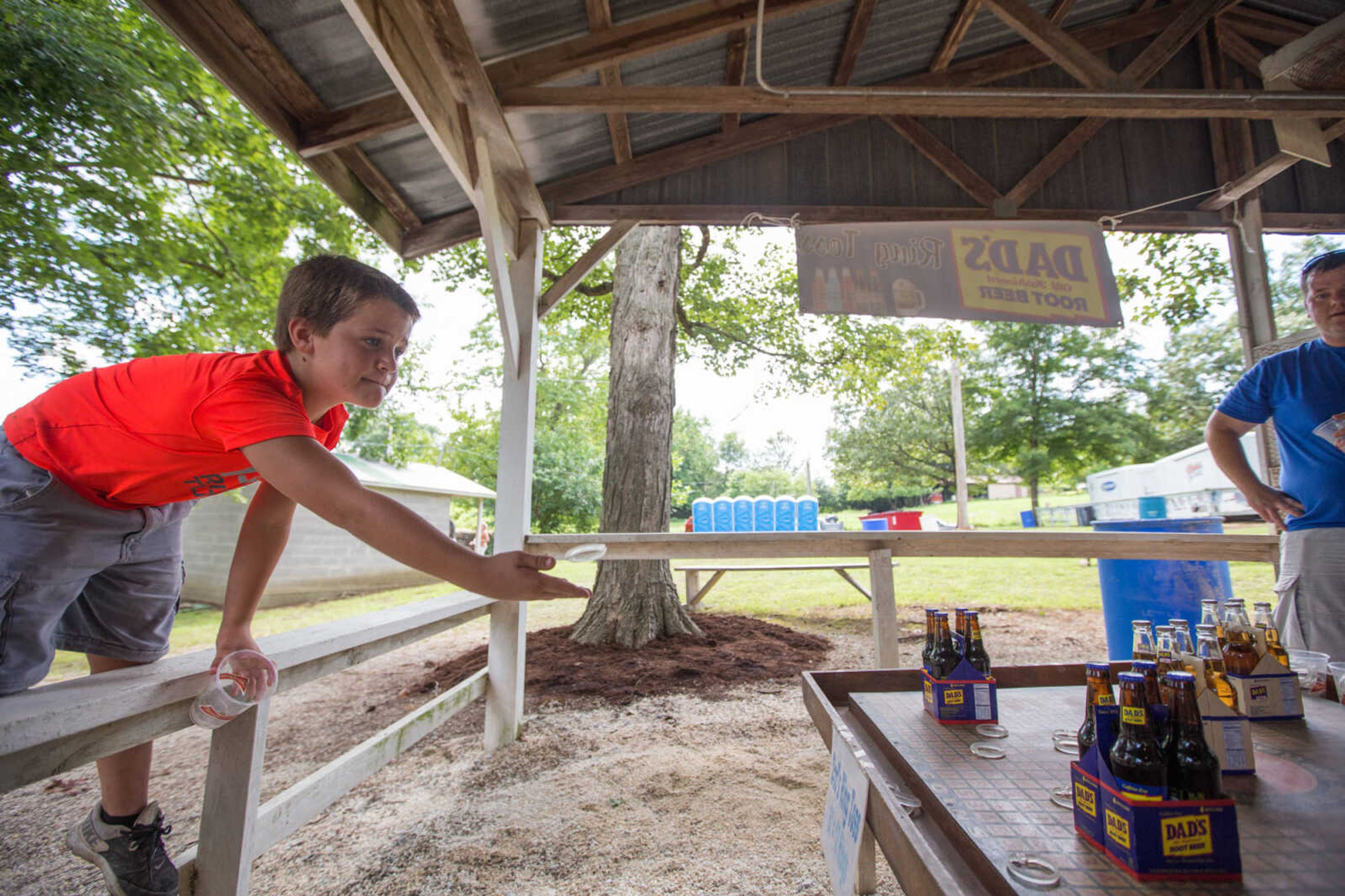 GLENN LANDBERG ~ glandberg@semissourian.com


Kids play a ring toss game during the annual parish picnic on Saturday, July 30, 2016 at St. John's Catholic Church in Leopold, Mo.