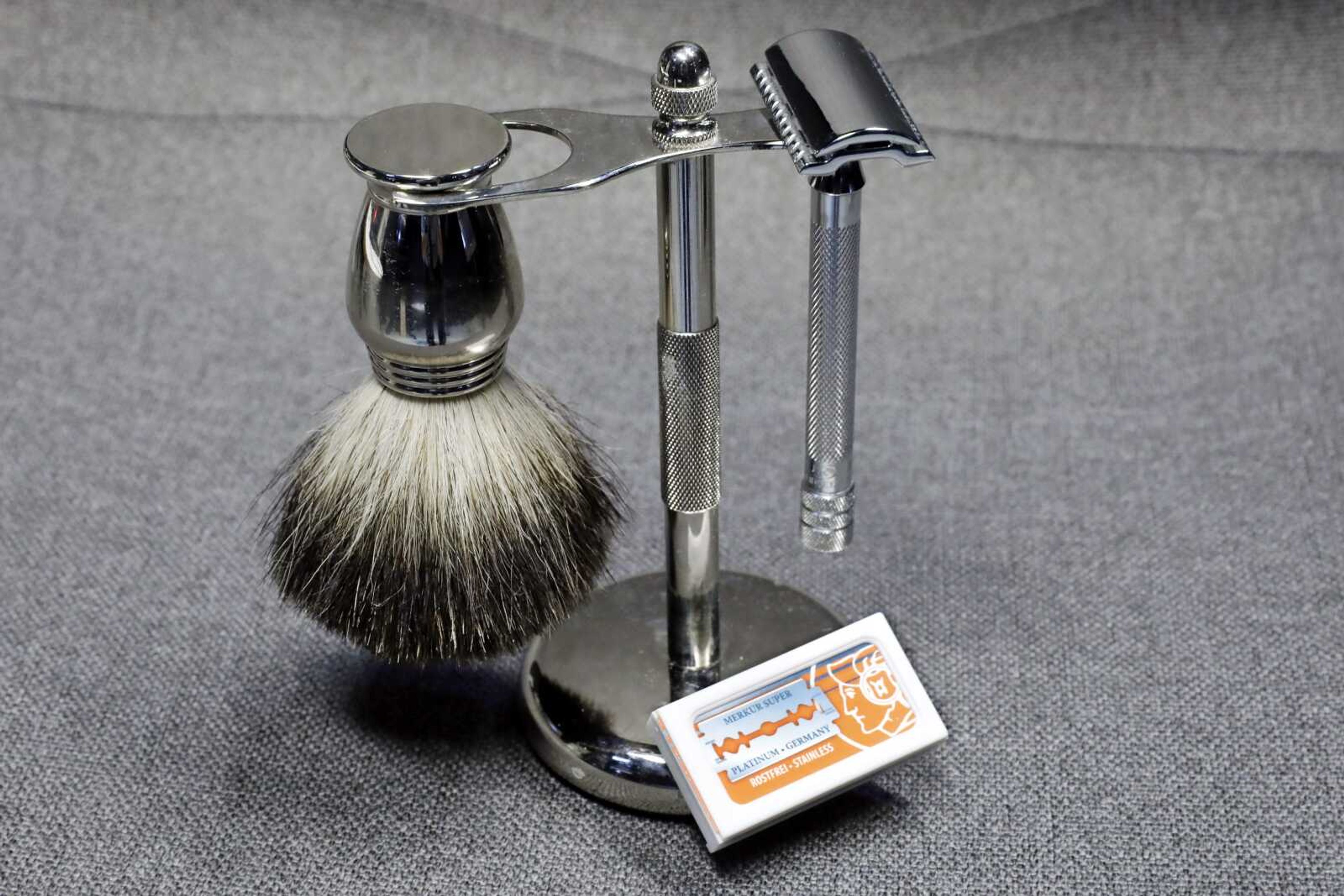 A Col. Ichabod Conk shave set and Merkur double-edged razor blades are seen Aug. 6 in New York. Remember the old-school safety razor your grandfather used? It's making a comeback. Trendy direct-to-consumer brands have reintroduced them to younger generations.