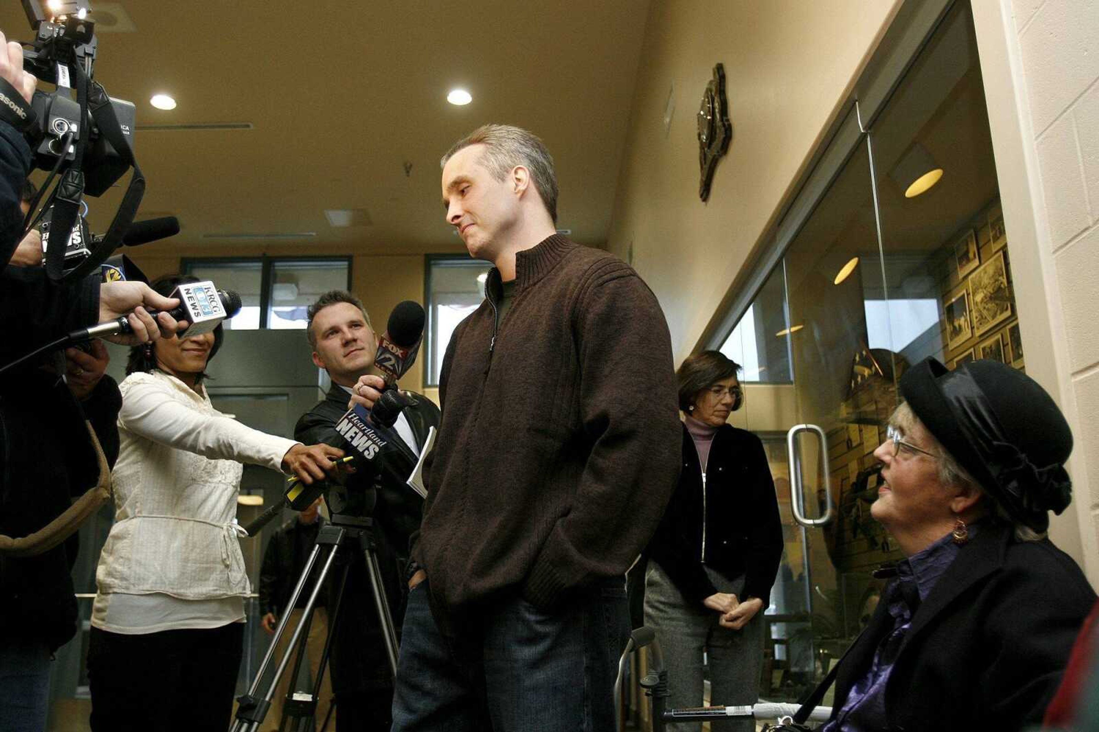 ELIZABETH DODD ~ edodd@semissourian.com
Joshua Kezer answers media questions on what he is planning to do as a free man while his mother Joan watches in the lobby of the Jefferson City Correctional Center on February 18, 2009.