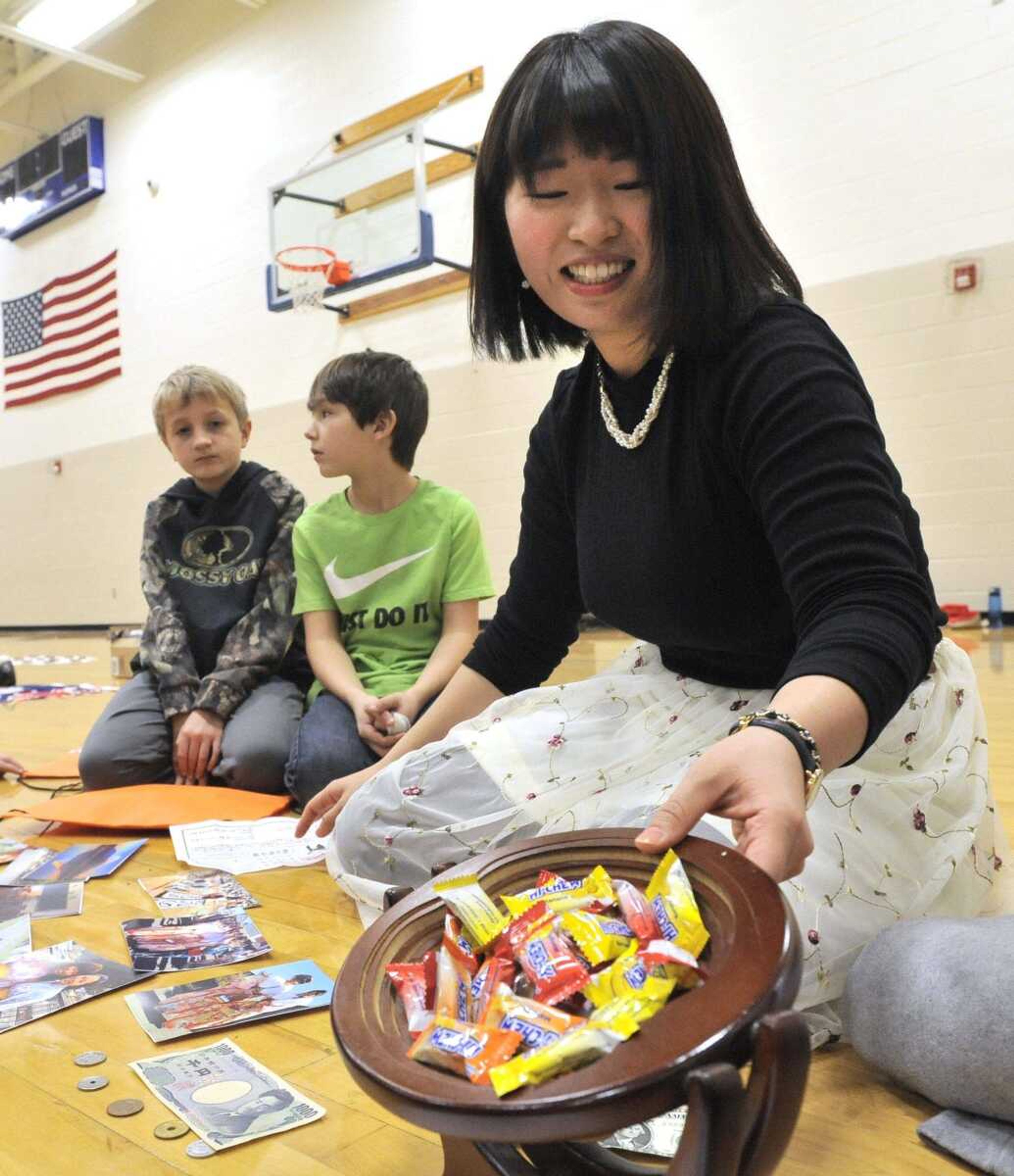 Yukiho Arikai, a native of Japan, shows candy from her country Wednesday, Feb. 1, 2017 at Oran Elementary School in Oran, Missouri.