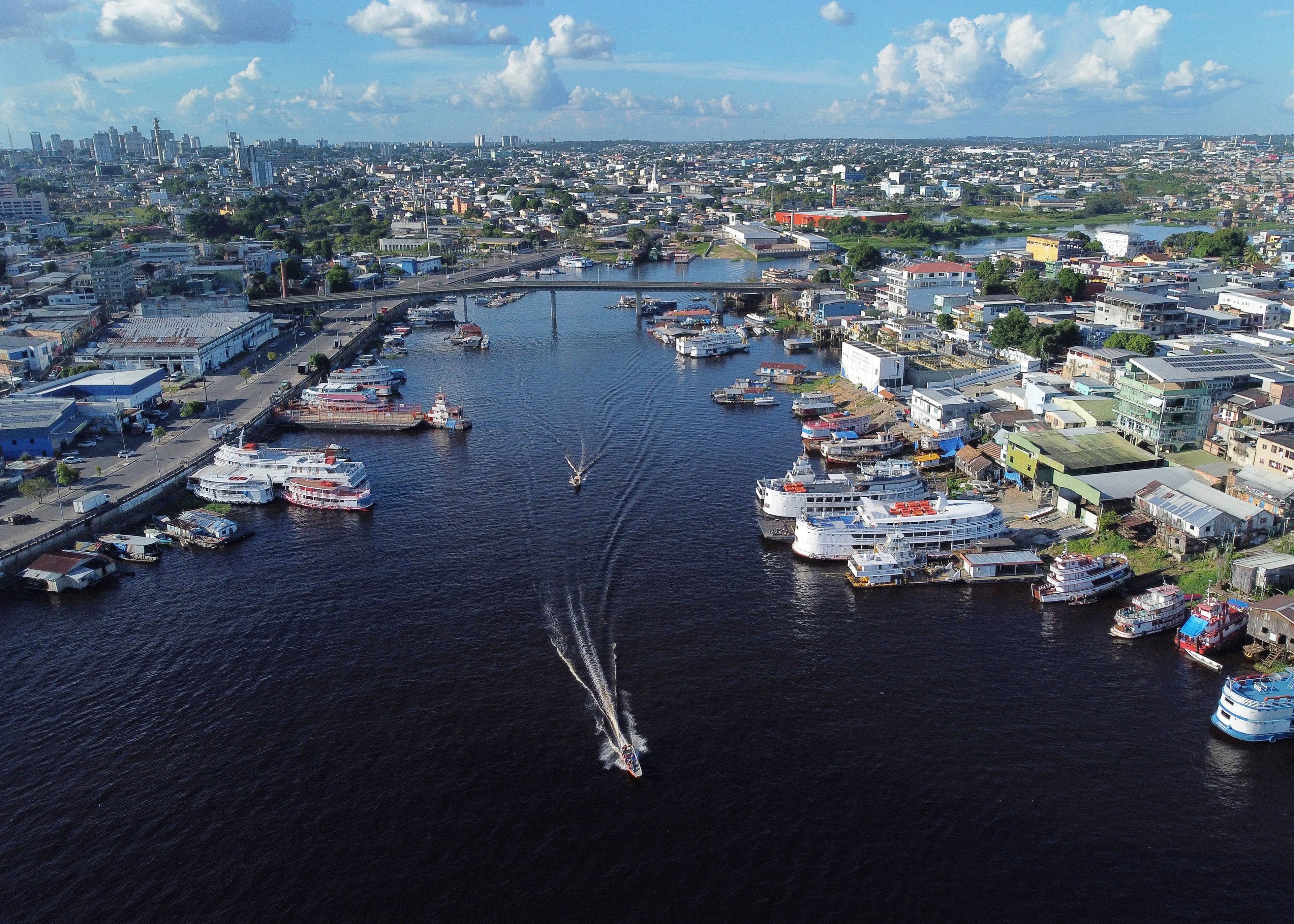 Part of the Educandos that connects to the Negro River is visible in Manaus, state of Amazonas, Brazil, Tuesday, June 17, 2024. (AP Photo/Edmar Barros)