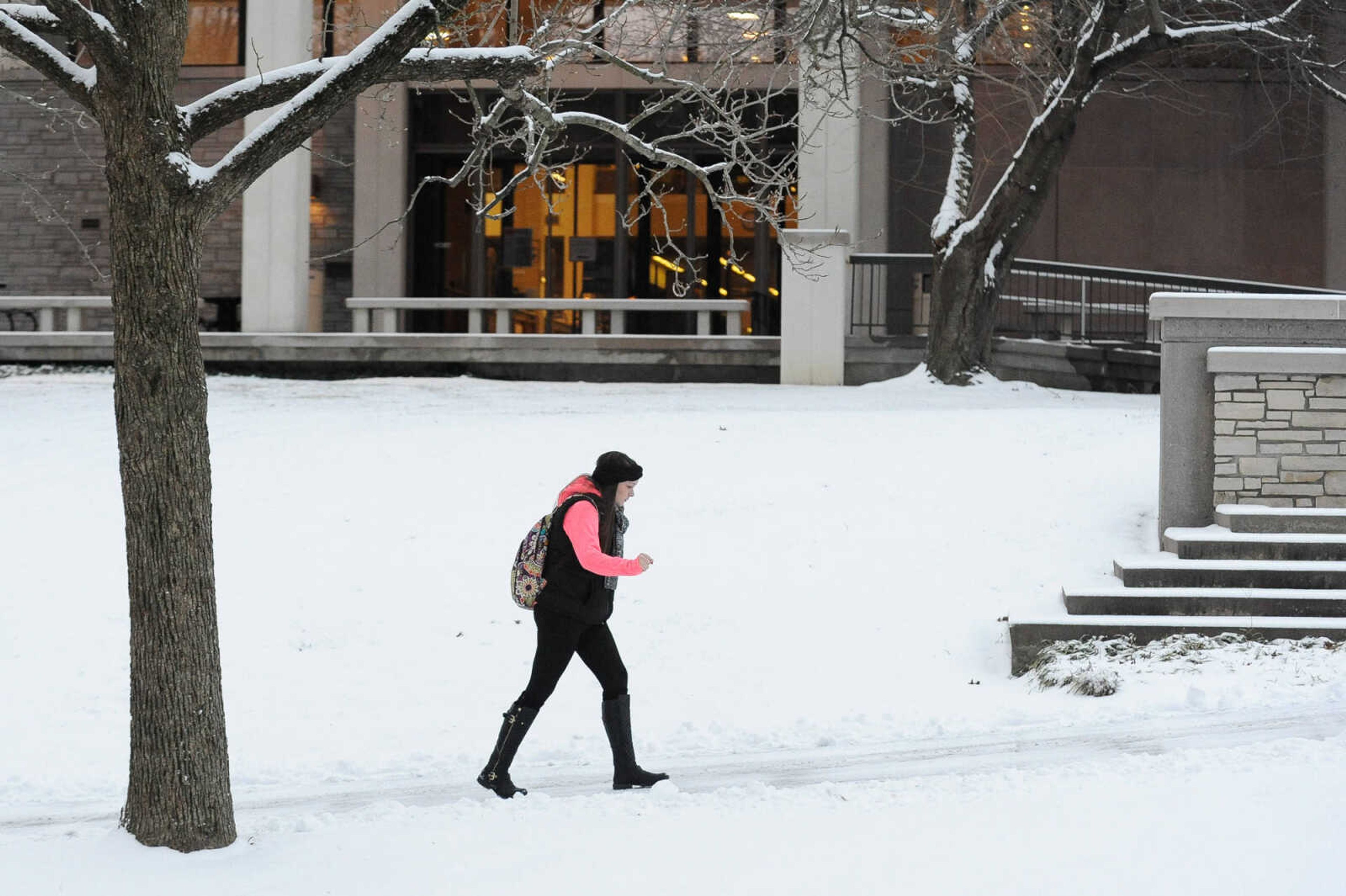 GLENN LANDBERG ~ glandberg@semissourian.com


A student makes her way along a sidewalk in front of Southeast Missouri State University's Kent Library Wednesday, Jan. 20, 2016.