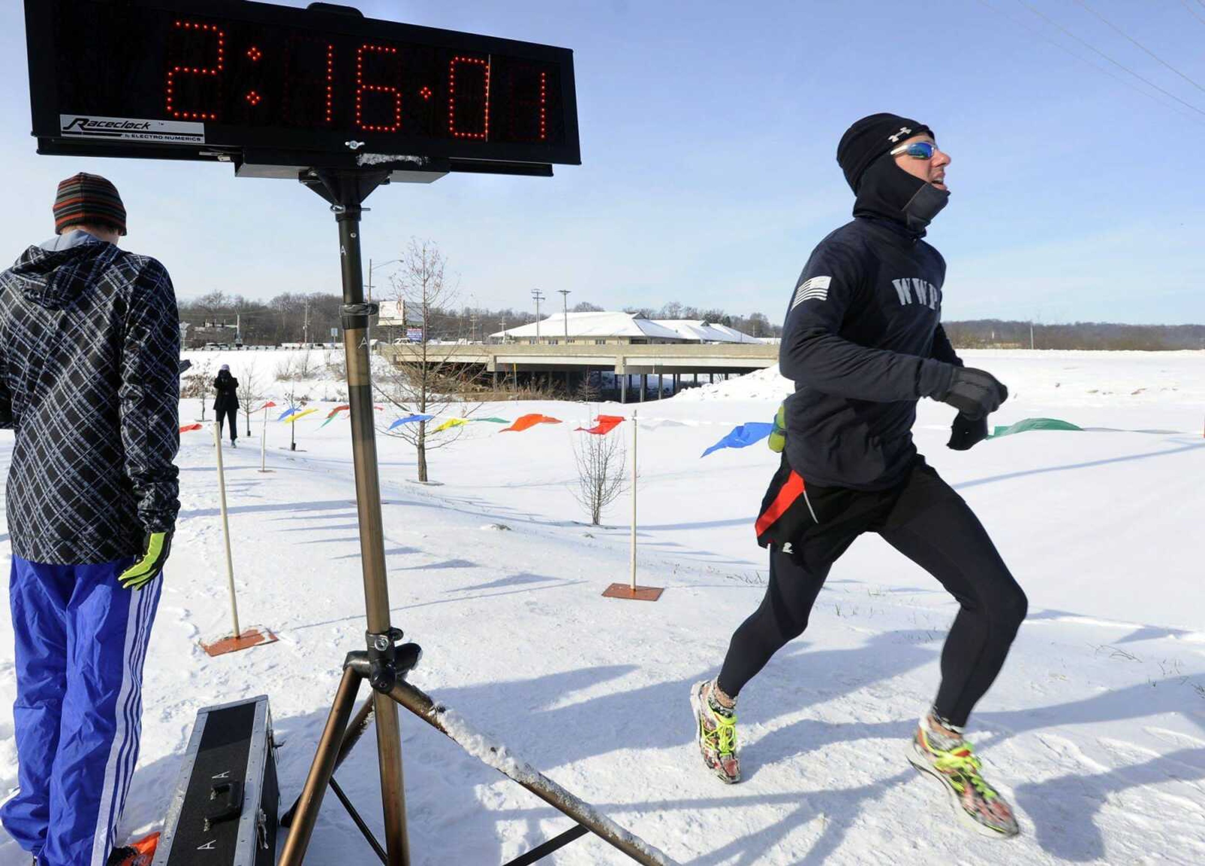 Bradley Smith finishes first in the St. Jude Frostbite Half-Marathon on Saturday in Cape Girardeau. (Fred Lynch)