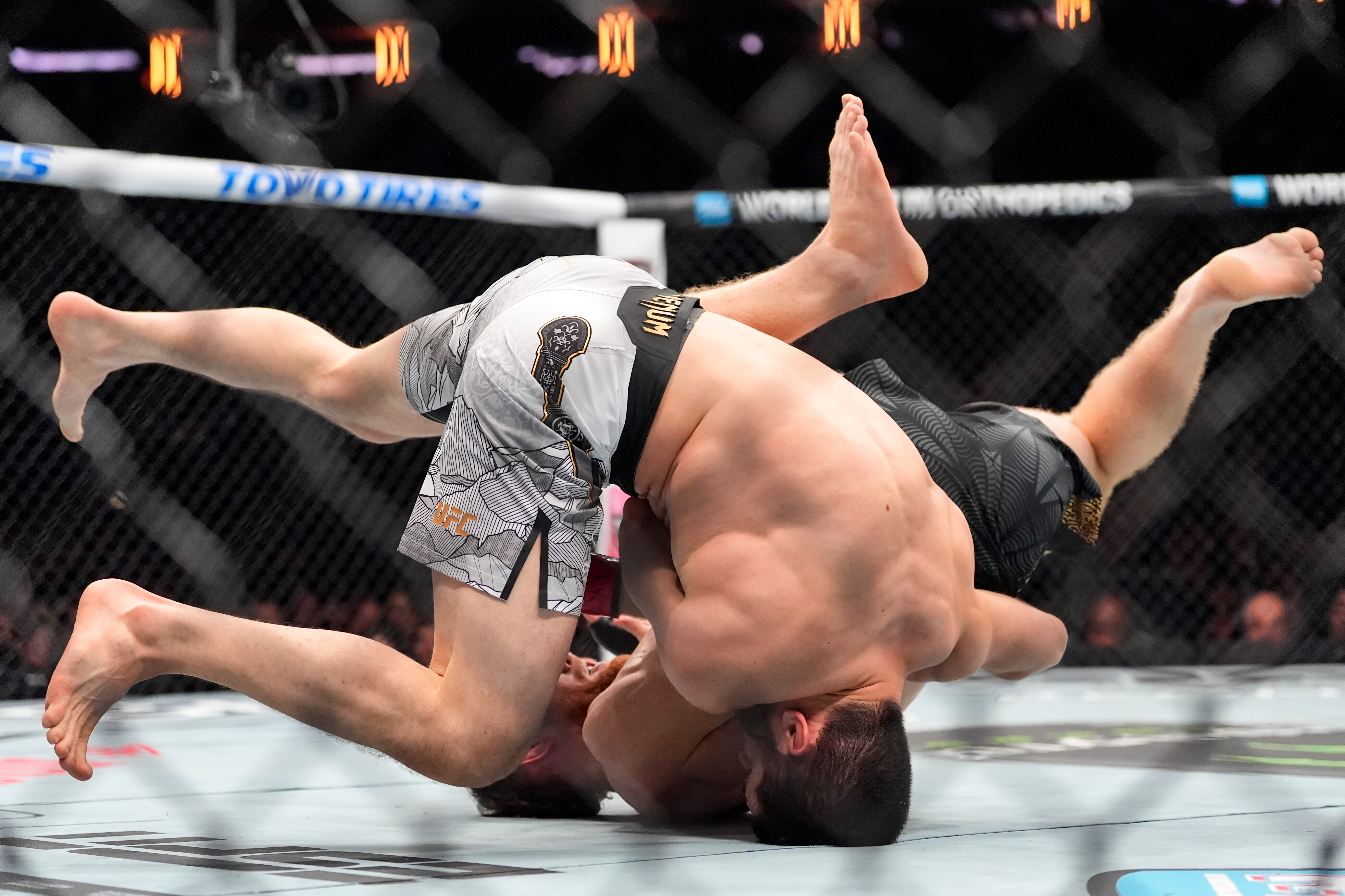 Islam Makhachev wins 170-pound title, ties UFC record with 1