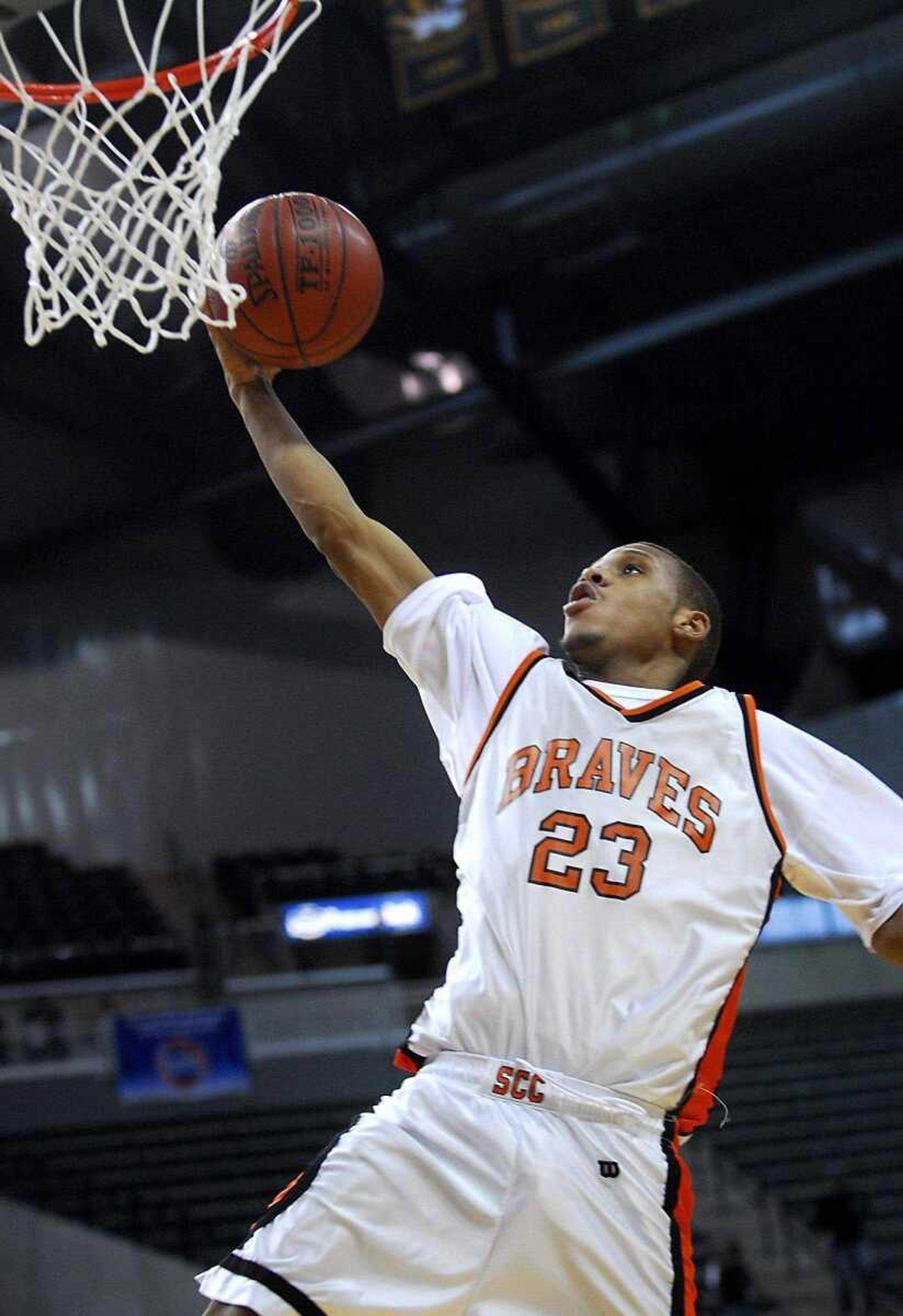 KIT DOYLE ~ kdoyle@semissourian.com<br>Scott County Central senior Drew Thomas goes in for a dunk during the Braves' Class 1 semifinal victory Thursday against Glasgow at Mizzou Arena in Columbia.