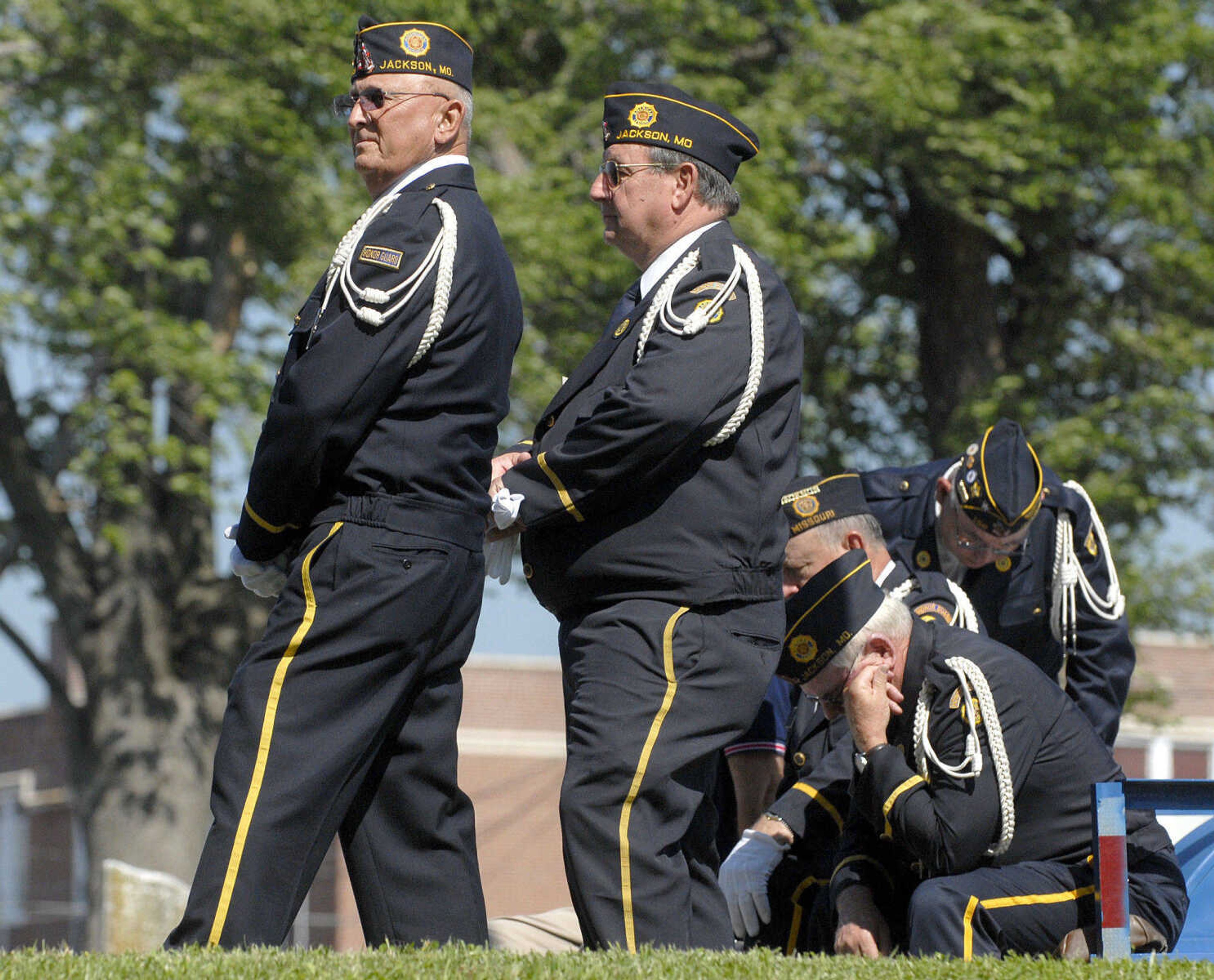 LAURA SIMON~lsimon@semissourian.com
Members of the American Legion Honor Guard Post 158 listen to guest speaker Larry Ferrell during the Memorial Day ceremony Monday, May 30, 2011 in Jackson.