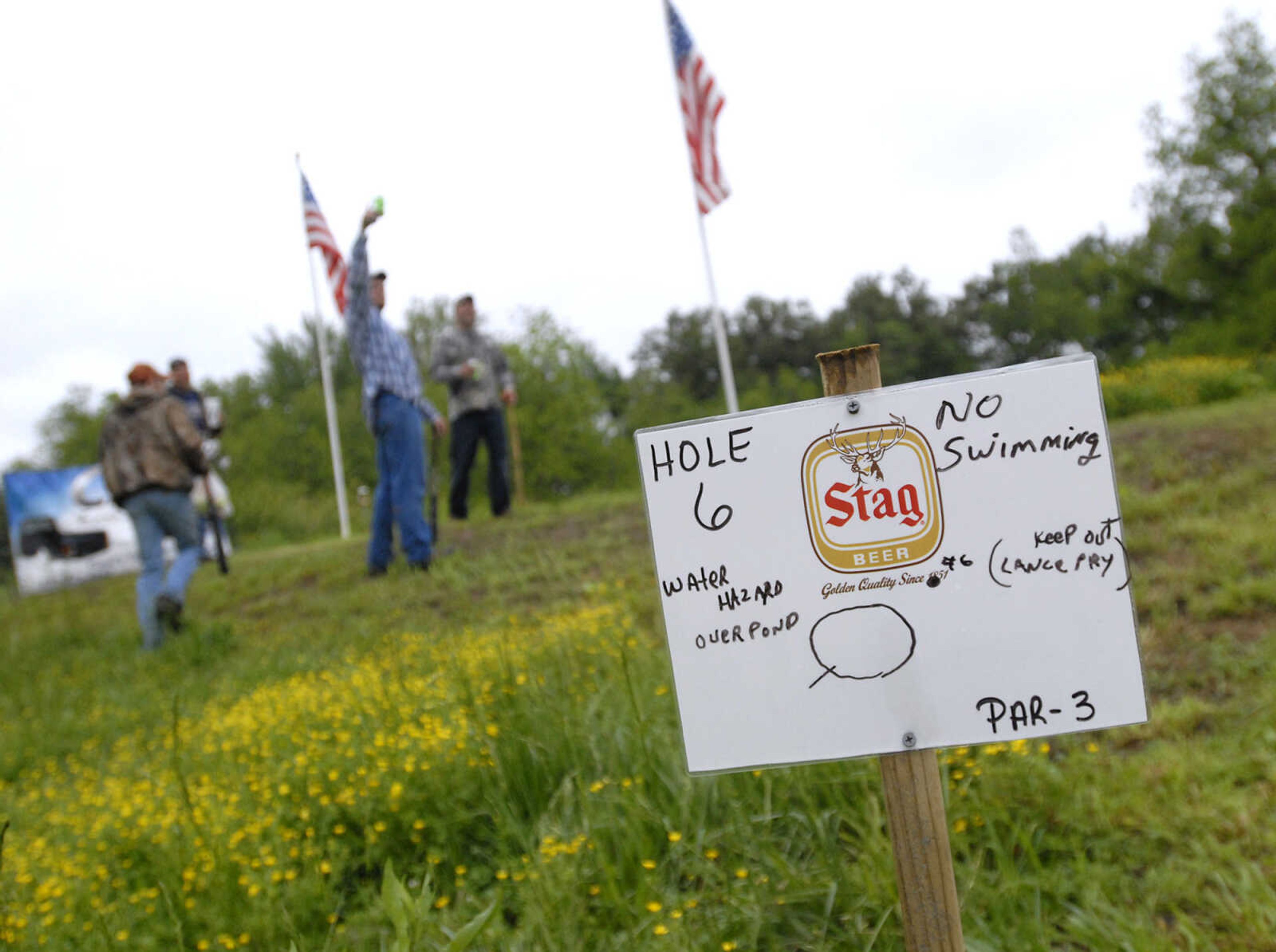 KRISTIN EBERTS ~ keberts@semissourian.com

A sign advises golfers of the water hazard during the Kow Pasture Klassic at Schlinder's Tavern in New Hamburg, Mo., on Saturday, May 14, 2011. Proceeds from the event benefit the Kenny Rogers Children's Center and the Missouri Veterans Home.