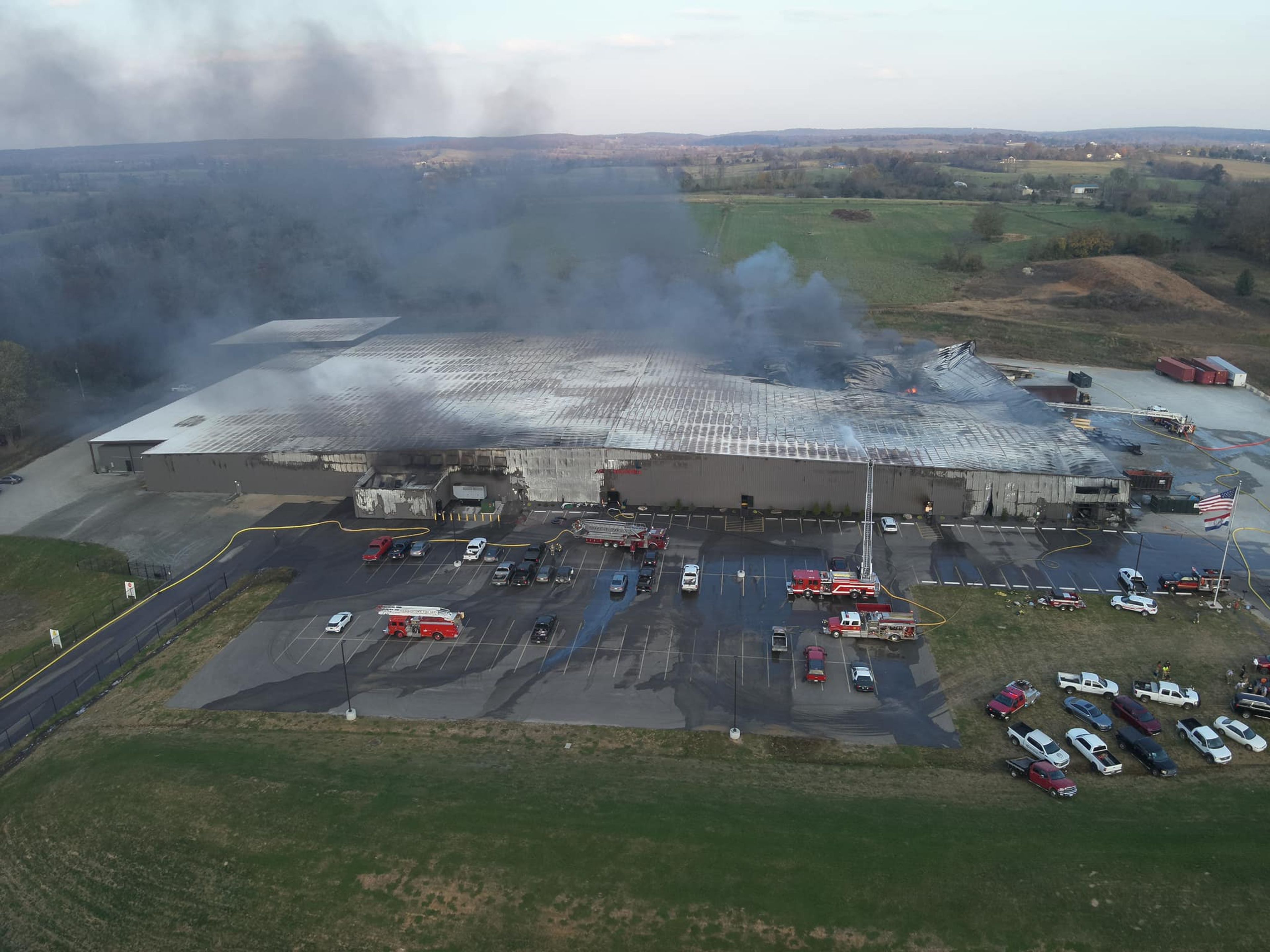 Smoke billows out of the collapsed roof at Critical Mineral Recovery’s lithium-ion battery recycling plant near Fredericktown. Nearby residents were instructed to stay inside or — if they were in the immediate vicinity — evacuate after a fire broke out at the facility Wednesday.