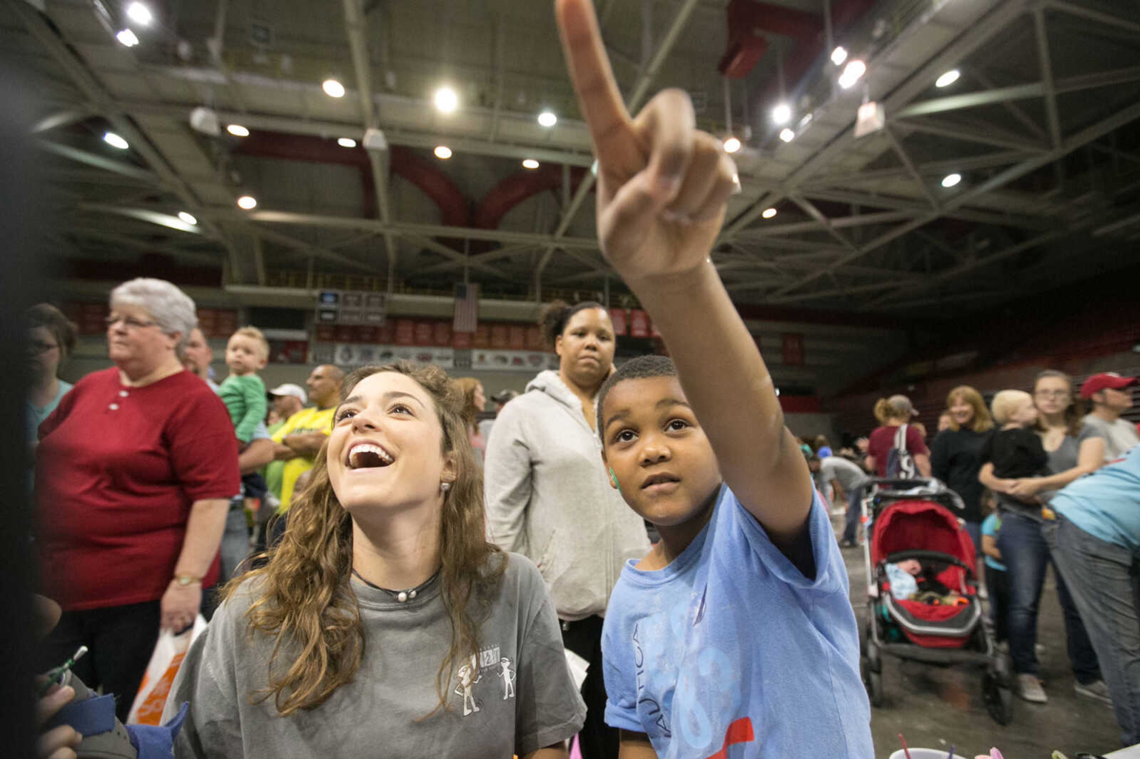 GLENN LANDBERG ~ glandberg@semissourian.com


Austin Waddy points something out to Meghan Arpin during the Messy Morning event Saturday, April 30, 2016 at the Show Me Center.