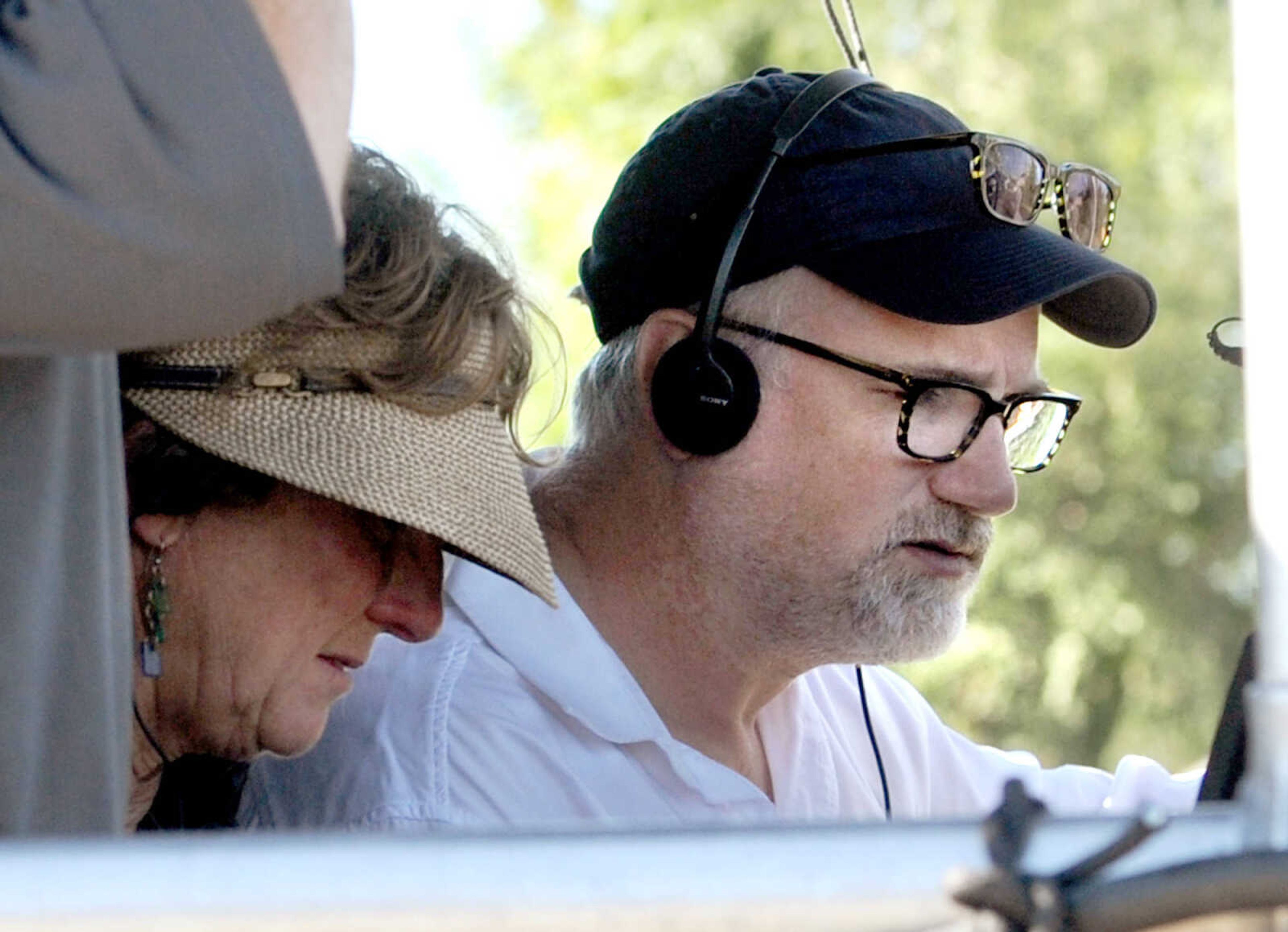 LAURA SIMON ~ lsimon@semissourian.com

A man believed to be director David Fincher, directs a car scene for 20th Century Fox's feature film "Gone Girl", near the Bill Emerson Memorial Bridge, Monday, Sept. 23, 2013, in Cape Girardeau.