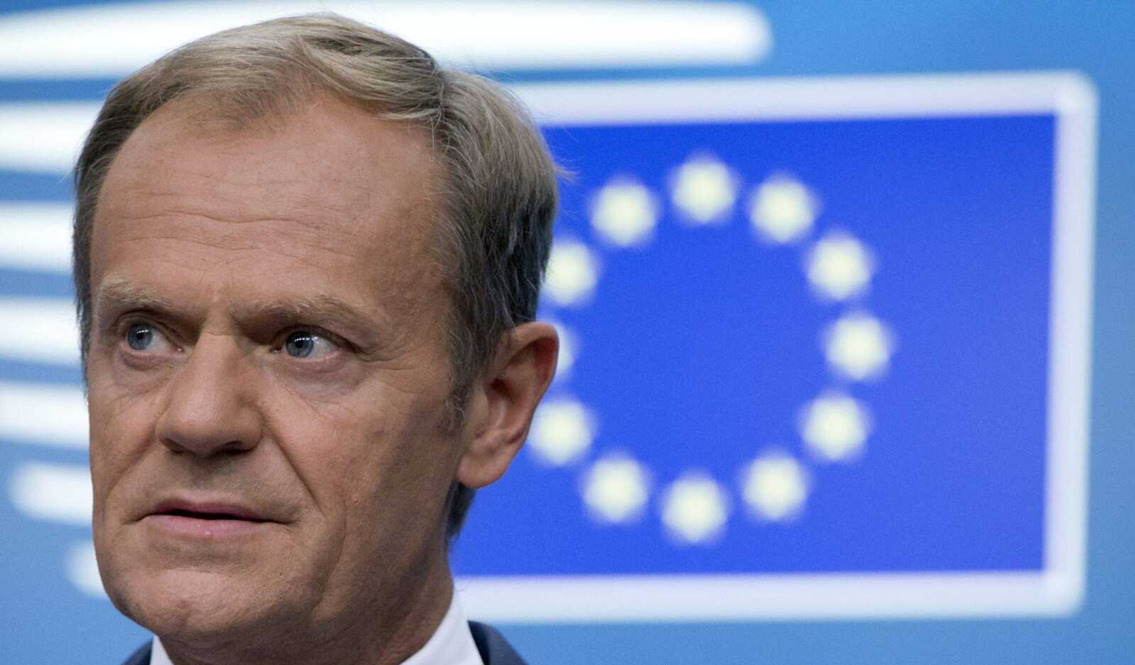 European Council President Donald Tusk speaks during a media conference Friday at an EU summit in Brussels. European Union leaders cried victory, claiming to have set aside major differences over how best to handle migrant arrivals.