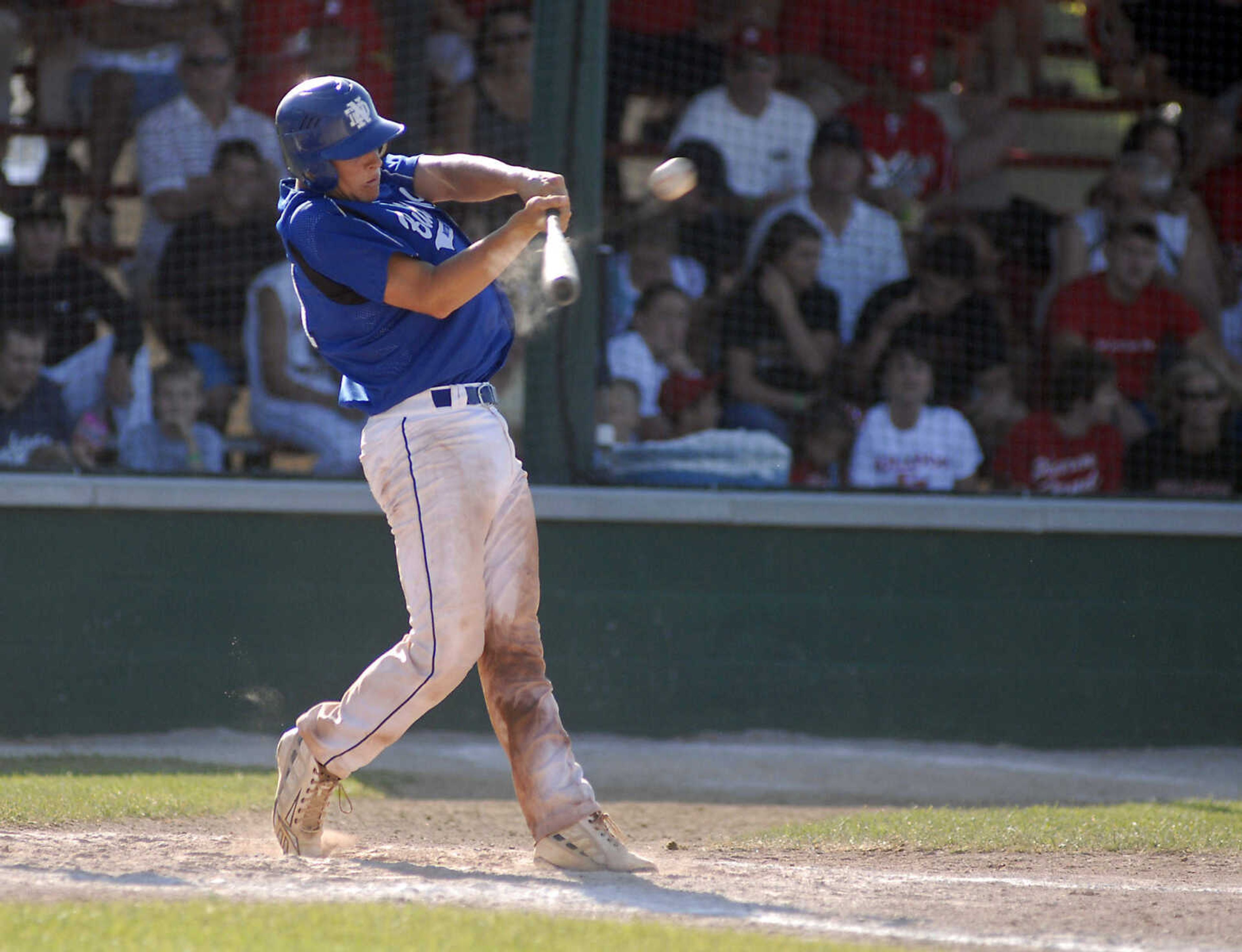 JUSTIN KELLEY photo
Notre Dame's Mark Hagedorn connects for a home run during the Class 3 championship game Saturday, June, 6 2009, against Carl Junction at Meador Park in Springfield.