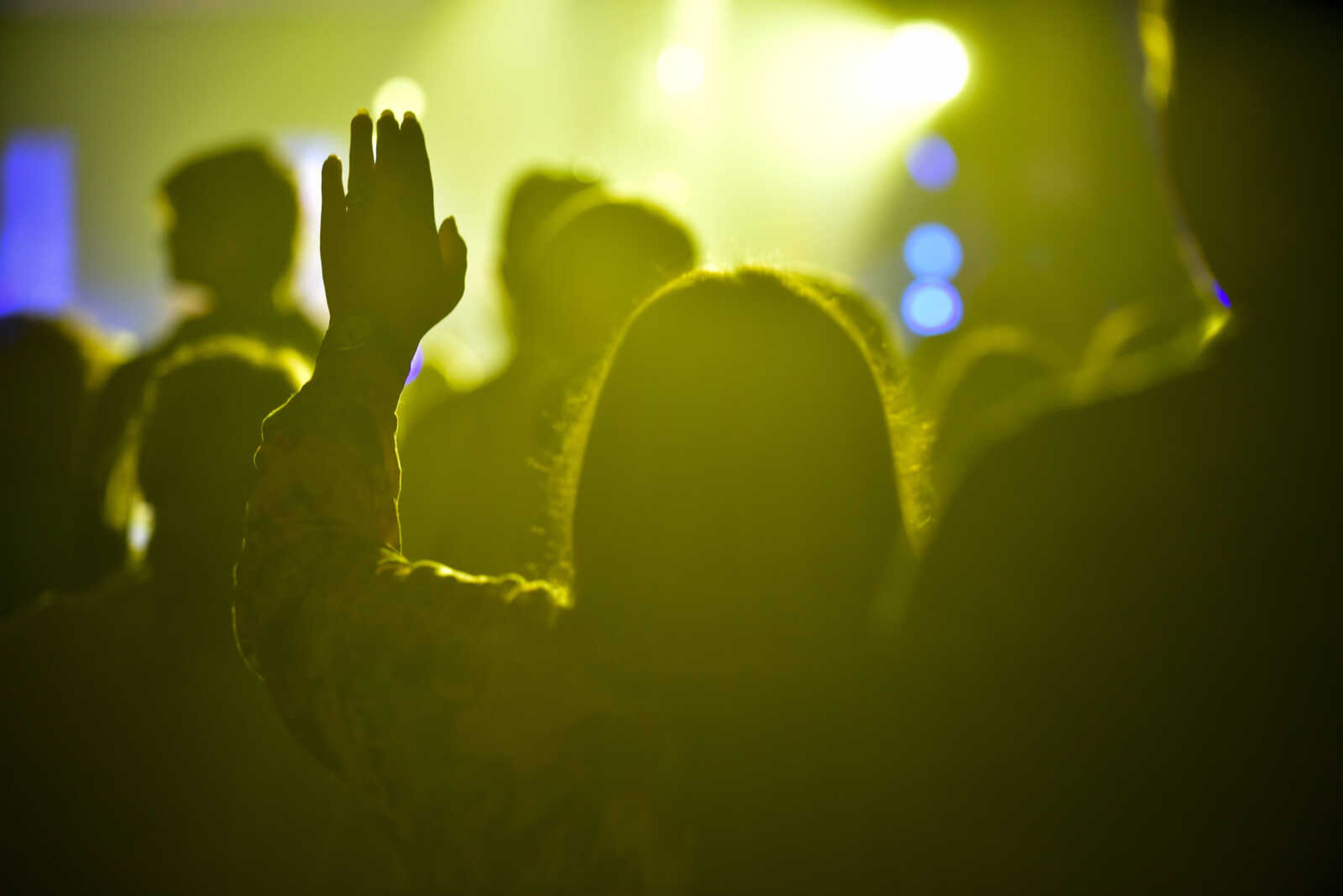 A member of the audience raises her hand during a Big Daddy Weave concert Wednesday, March 14, 2018, at Cape Bible Chapel in Cape Girardeau.