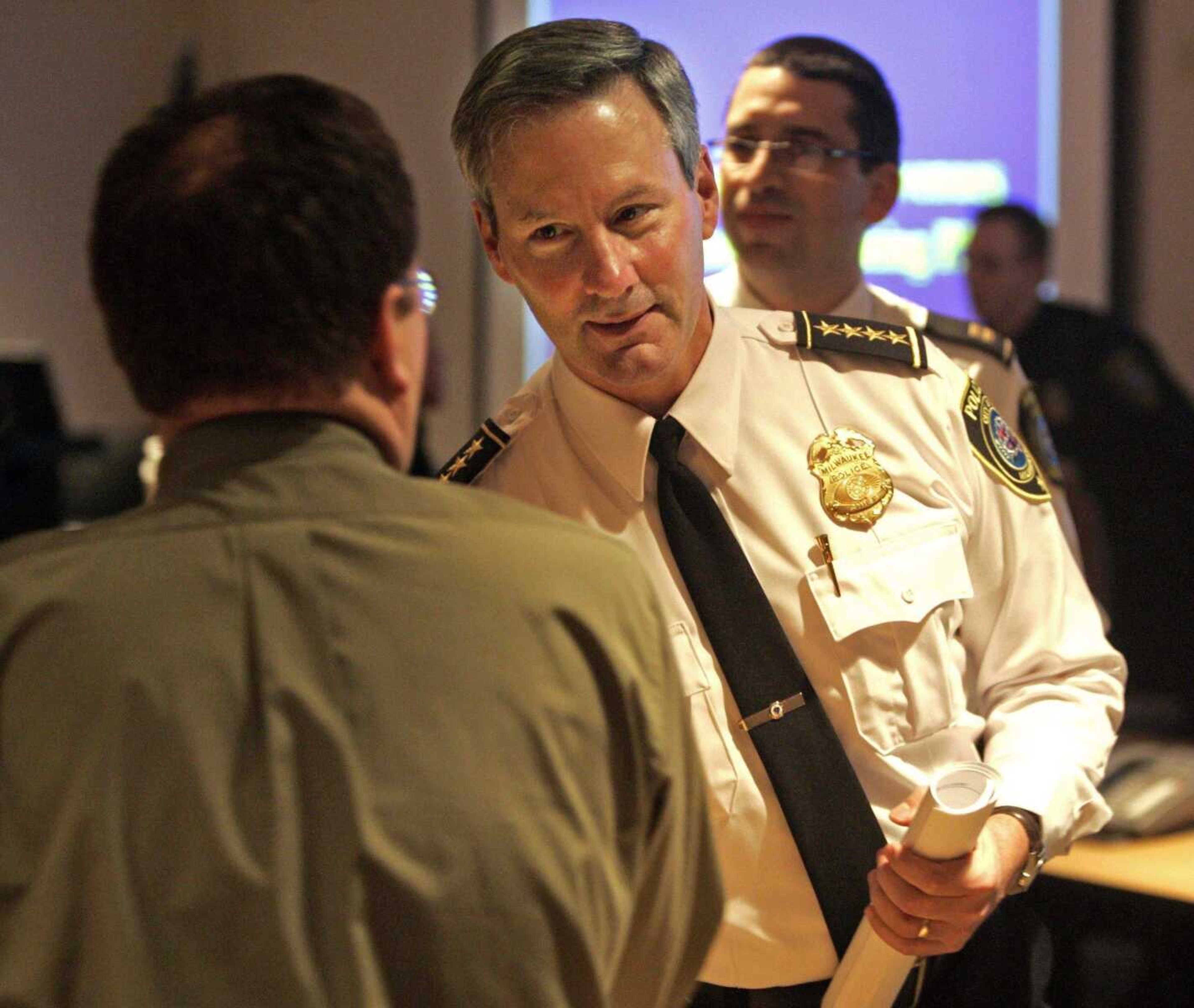 Tom Lynn ~ Journal Sentinel<br>Milwaukee police chief Edward A. Flynn greets residents at a meeting Jan. 16. 2007, to announce a neighborhood policing plan. Killings dropped by a third in 2008, making Wisconsin's largest city among the nation's most successful in tackling its 2008 murder rate.