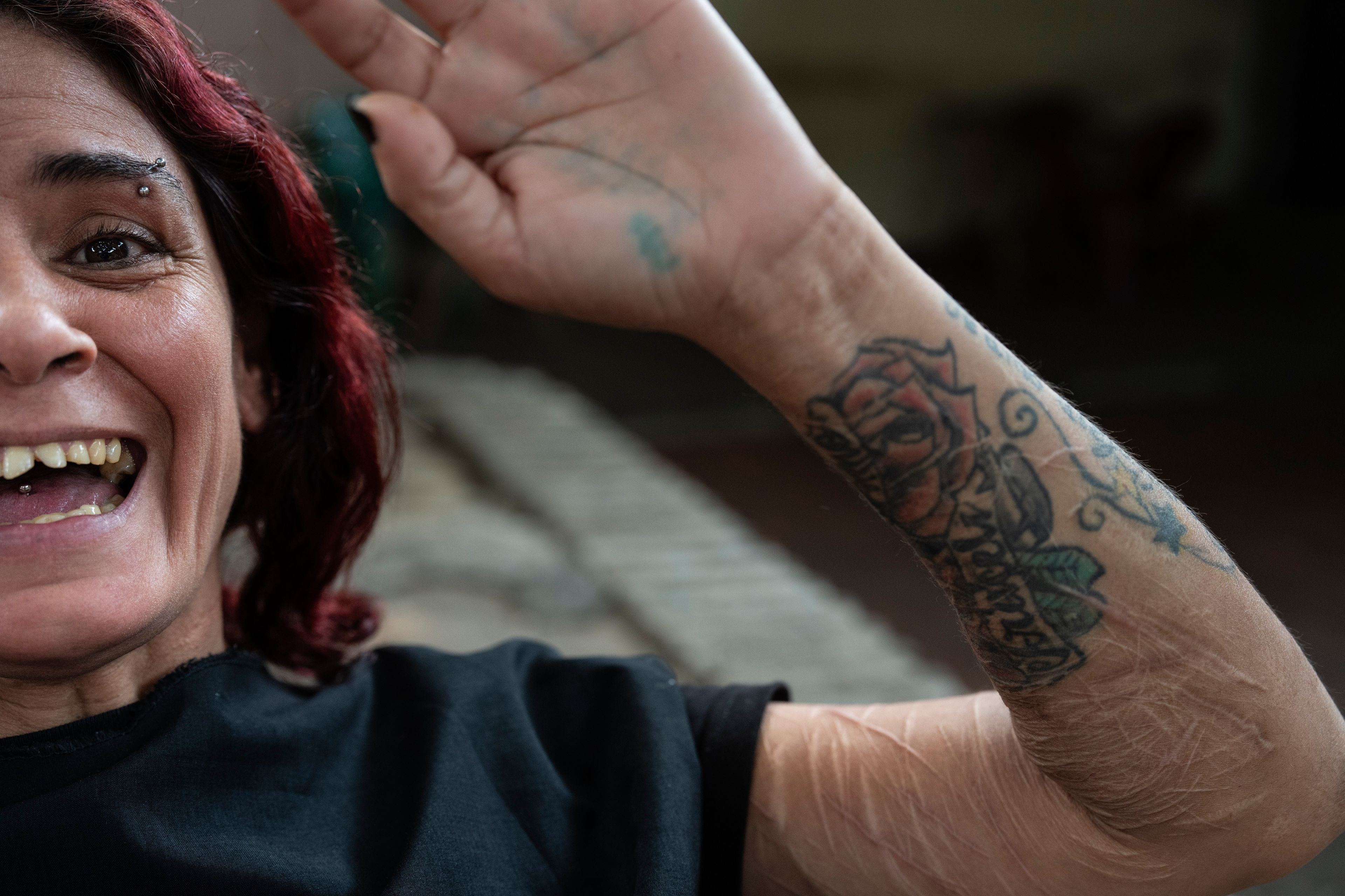 Liz Cardozo, 40, who said she has been in jail for seven months with no trial, smiles inside the Buen Pastor women's prison in Asuncion, Paraguay, Monday, Sept. 2, 2024. Cardozo said she was arrested for fighting with a neighbor. (AP Photo/Rodrigo Abd)