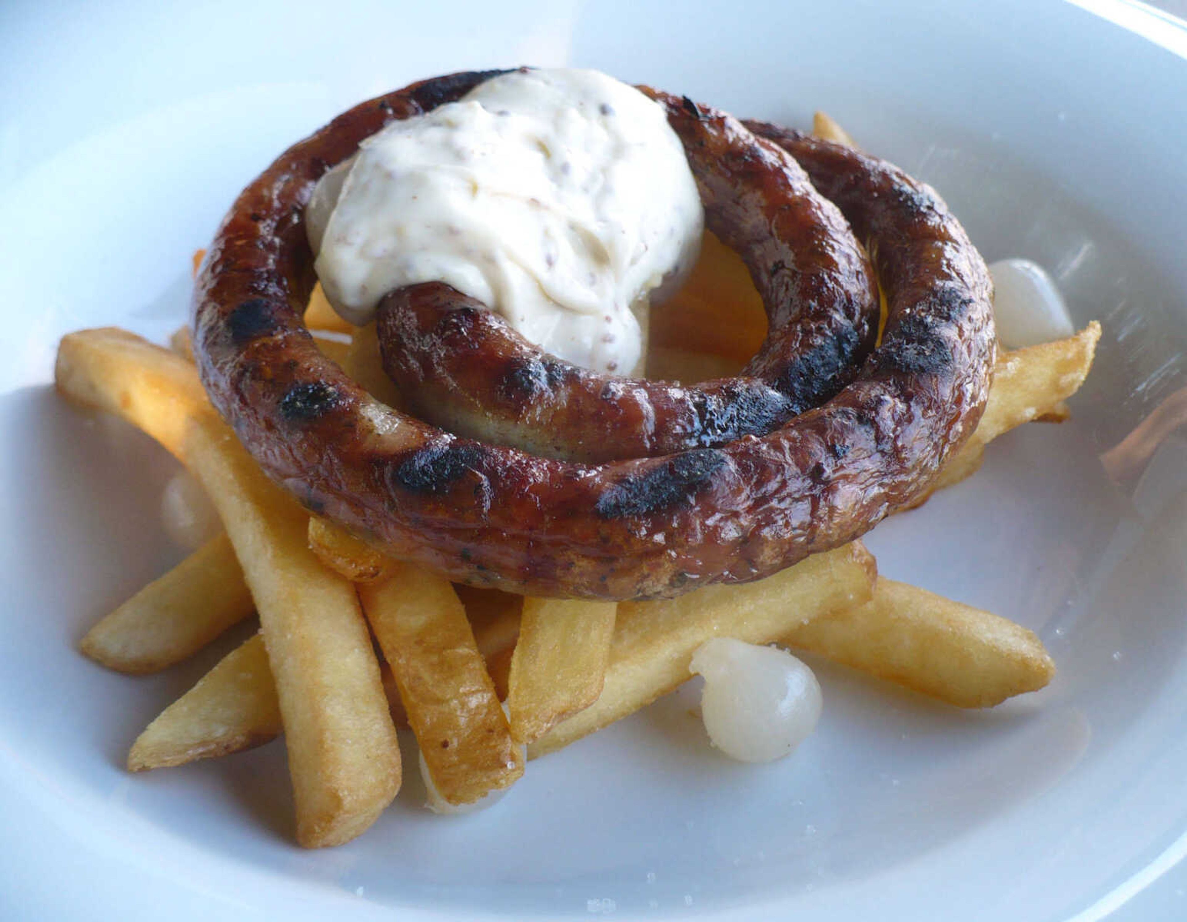 Sausages and fries make for delicious street food in Prague.