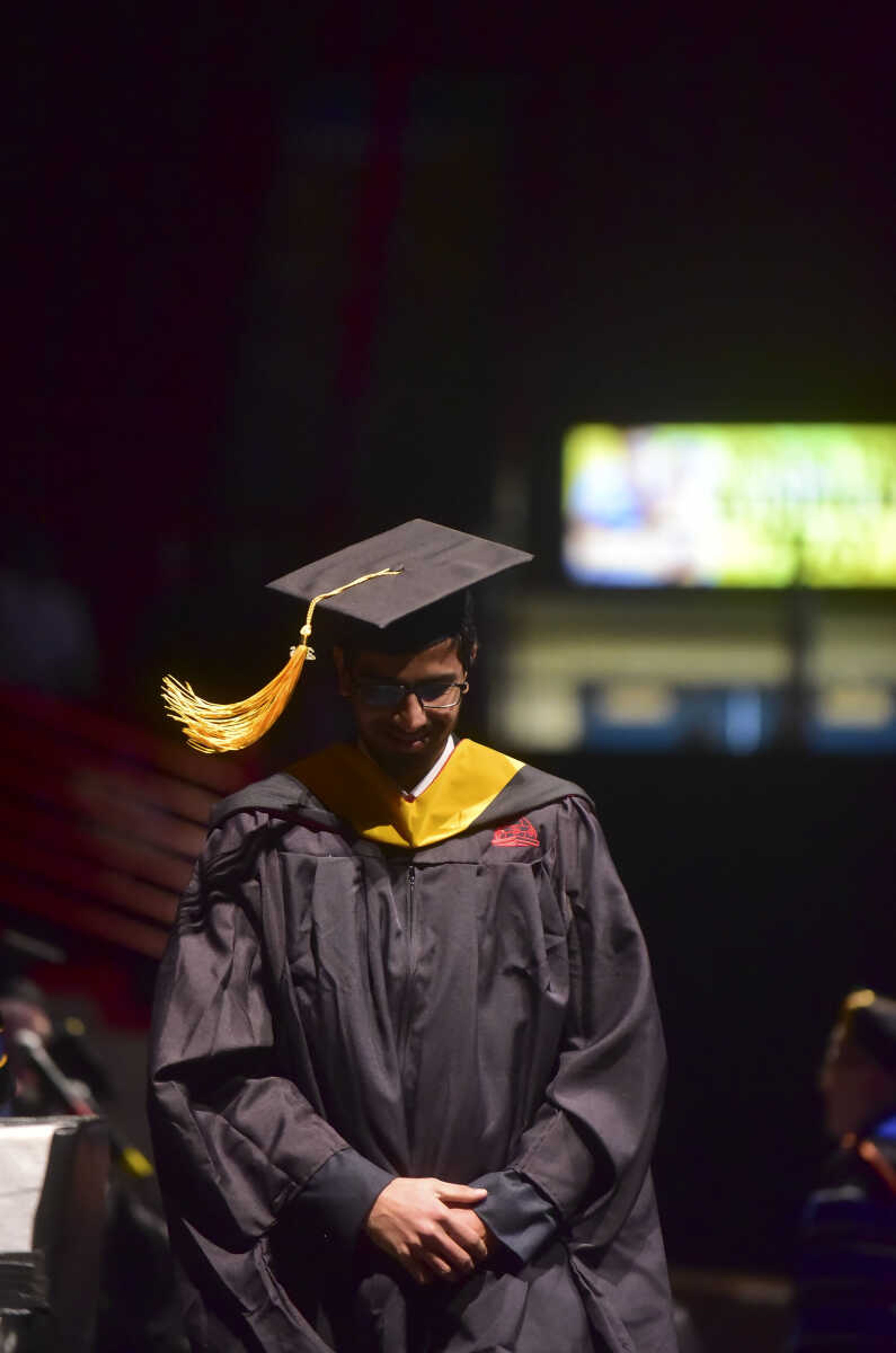 ANDREW J. WHITAKER ~ awhitaker@semissourian.com
Students walk on stage during Southeast Missouri State University graduation Saturday, Dec. 17, 2016 at the Show Me Center in Cape Girardeau.