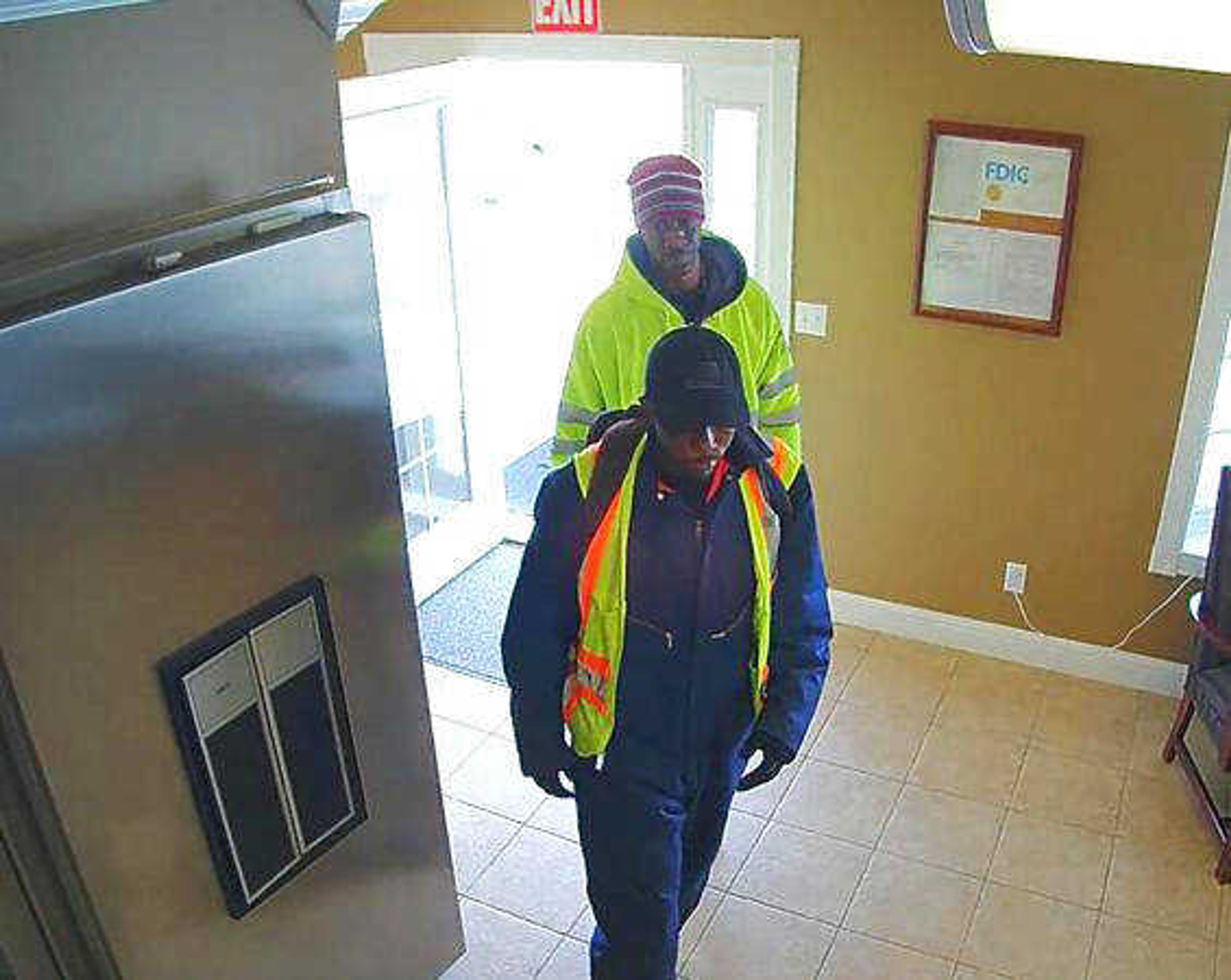 A video image of the two robbers who held up a bank in Essex, Mo., on March 17.