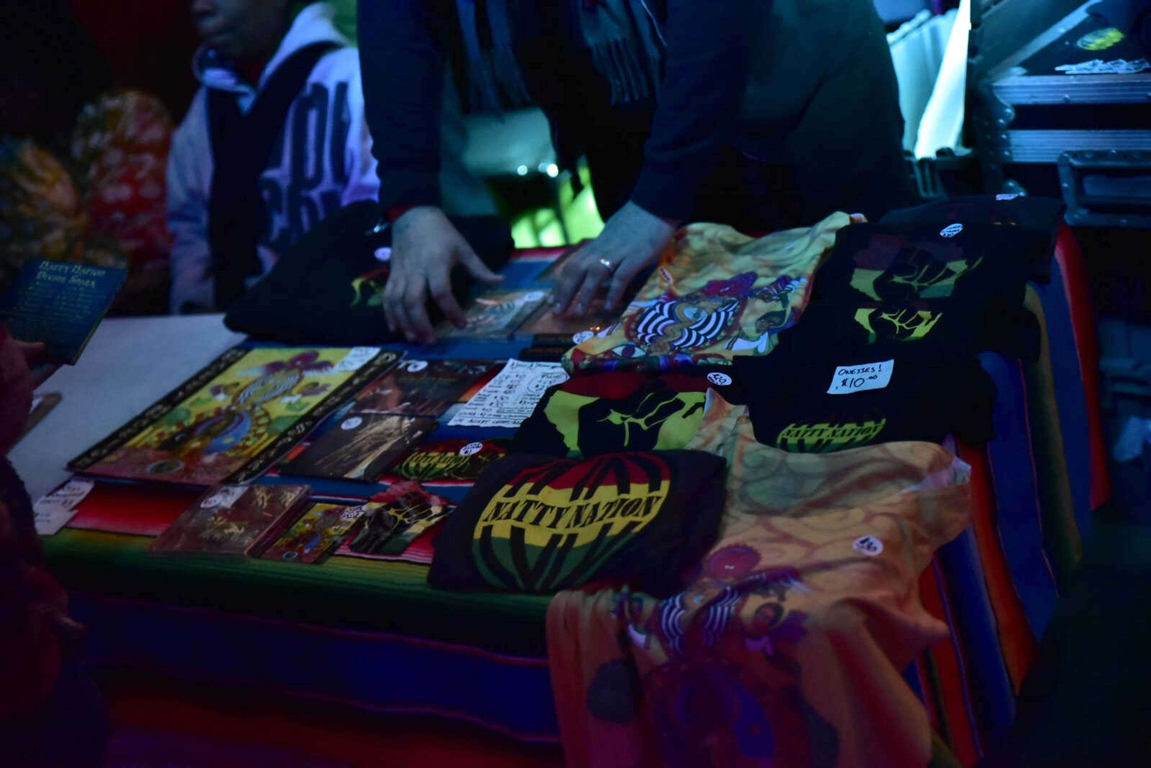 Reggae band Natty Nation's merchandise table at the 3rd annual Bob Marley Day celebration held at Ragsdales in downtown Cape Girardeau Feb. 10, 2018.