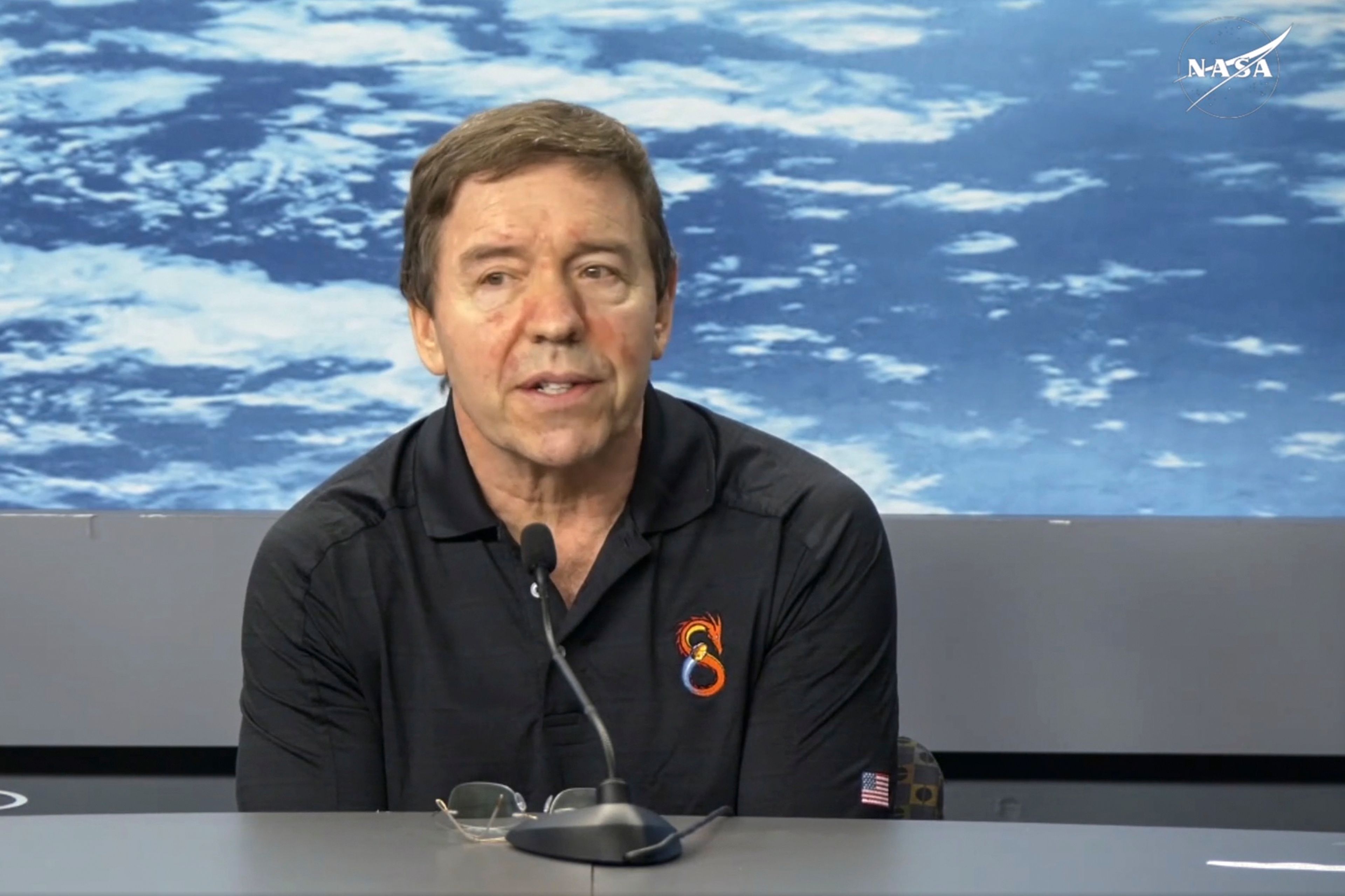 In this image from video provided by NASA, astronaut Michael Barratt speaks during a news conference at the agency’s Johnson Space Center in Houston on Friday, Nov. 8, 2024. (NASA via AP)