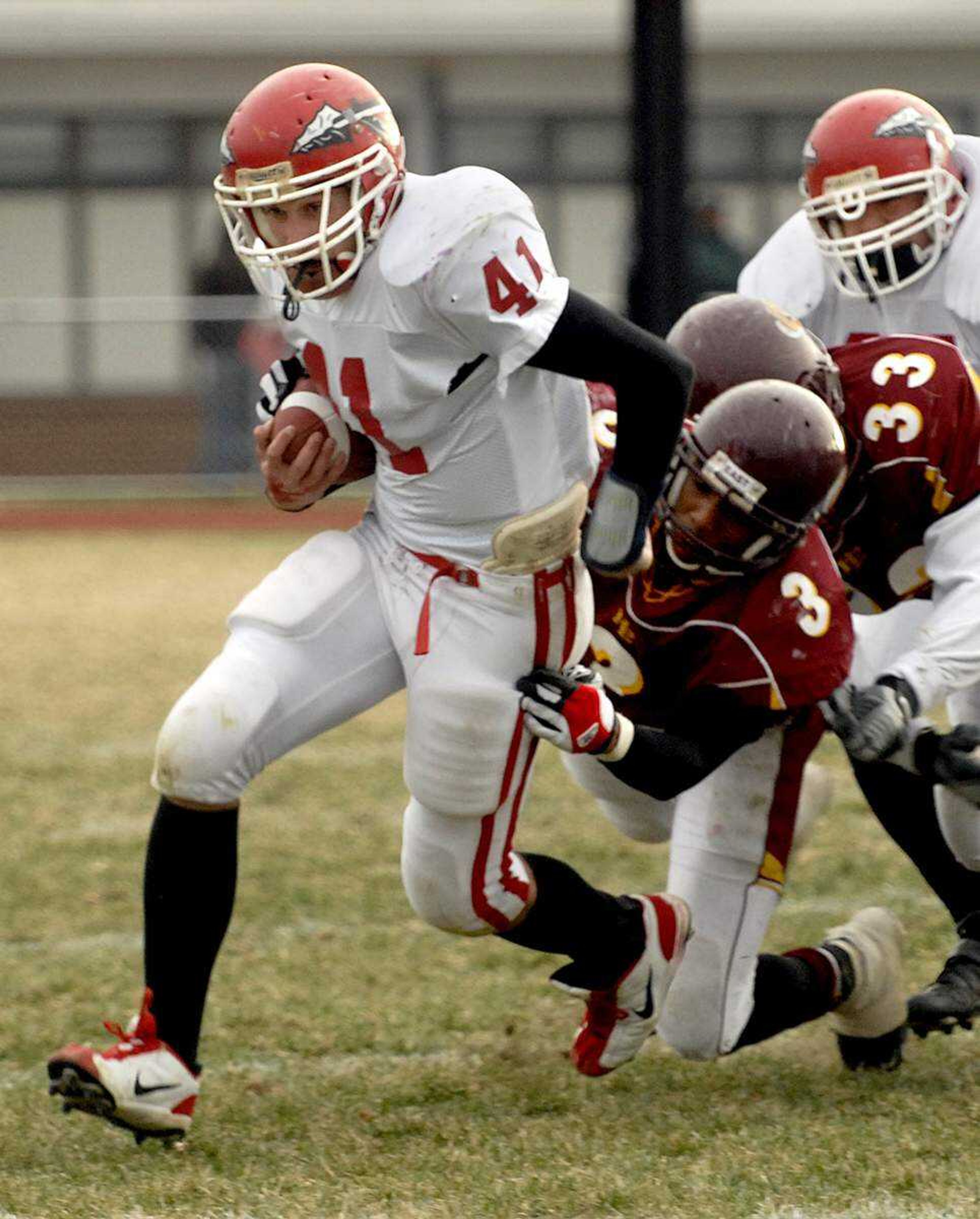 ELIZABETH DODD ~ edodd@semissourian.com
Jackson's Adam Zweigart gains some yards against Hazelwood East's Christian Kirksey in the third quarter of the Class 5 state semifinal game at Hazelwood Saturday.