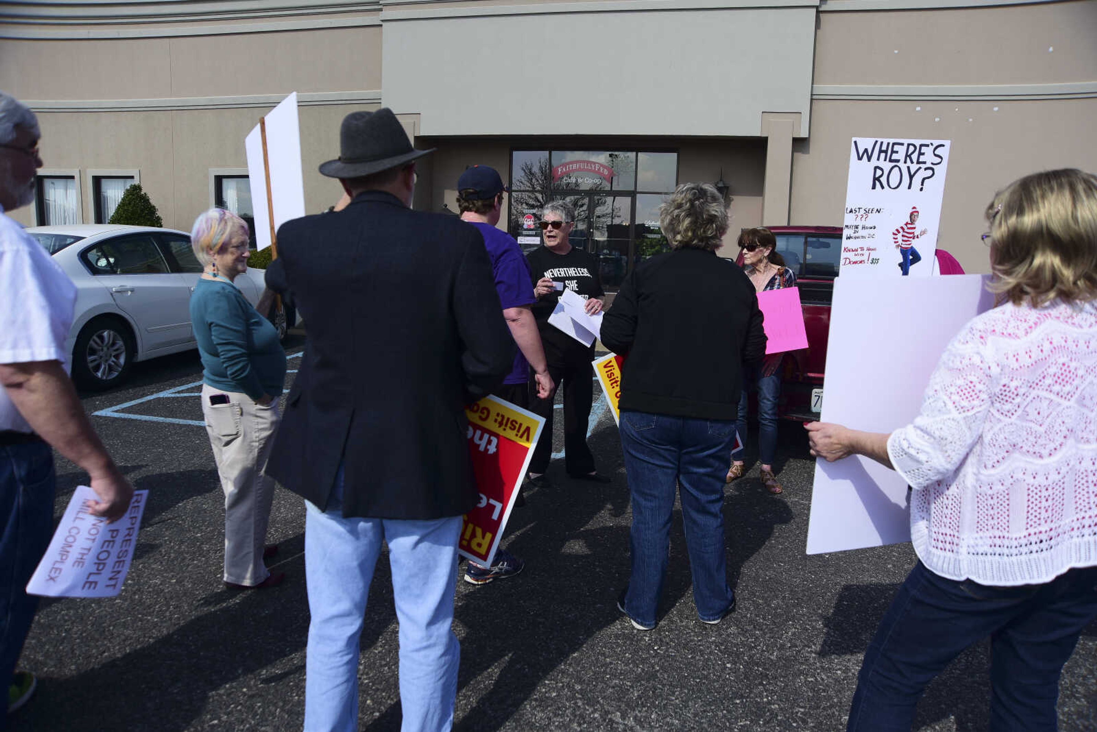 About 50 people with the Liberal Women Unite-Southeast MO Chapter demonstrate in front of U.S. Sen. Roy Blunt's office Wednesday, Feb. 22, 2017 in Cape Girardeau. Protestors held signs and chanted "Where's Roy" to demand a Town Hall Meeting with Senator Roy Blunt. As they spoke with the District Director, Darren Lingle, they brought up concerns they had along with saying they were not paid to be there with some having to even take vacation time to state what they believe in.