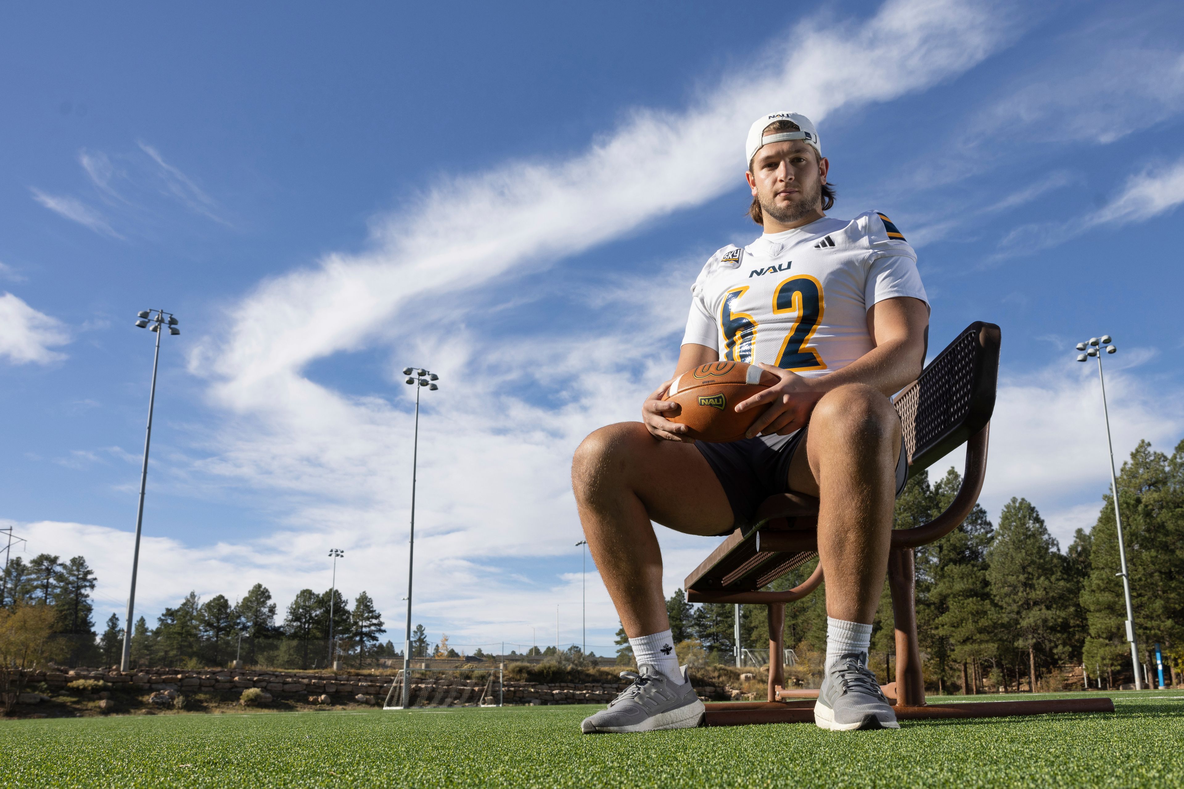 Northern Arizona University's Jonny Bottorff took advantage of new NIL money making opportunities and rebooted his college football career. Bottorff poses for a photo on the campus on NAU on Monday, Oct. 28, 2024, in Flagstaff, Ariz. (AP Photo/Josh Biggs)