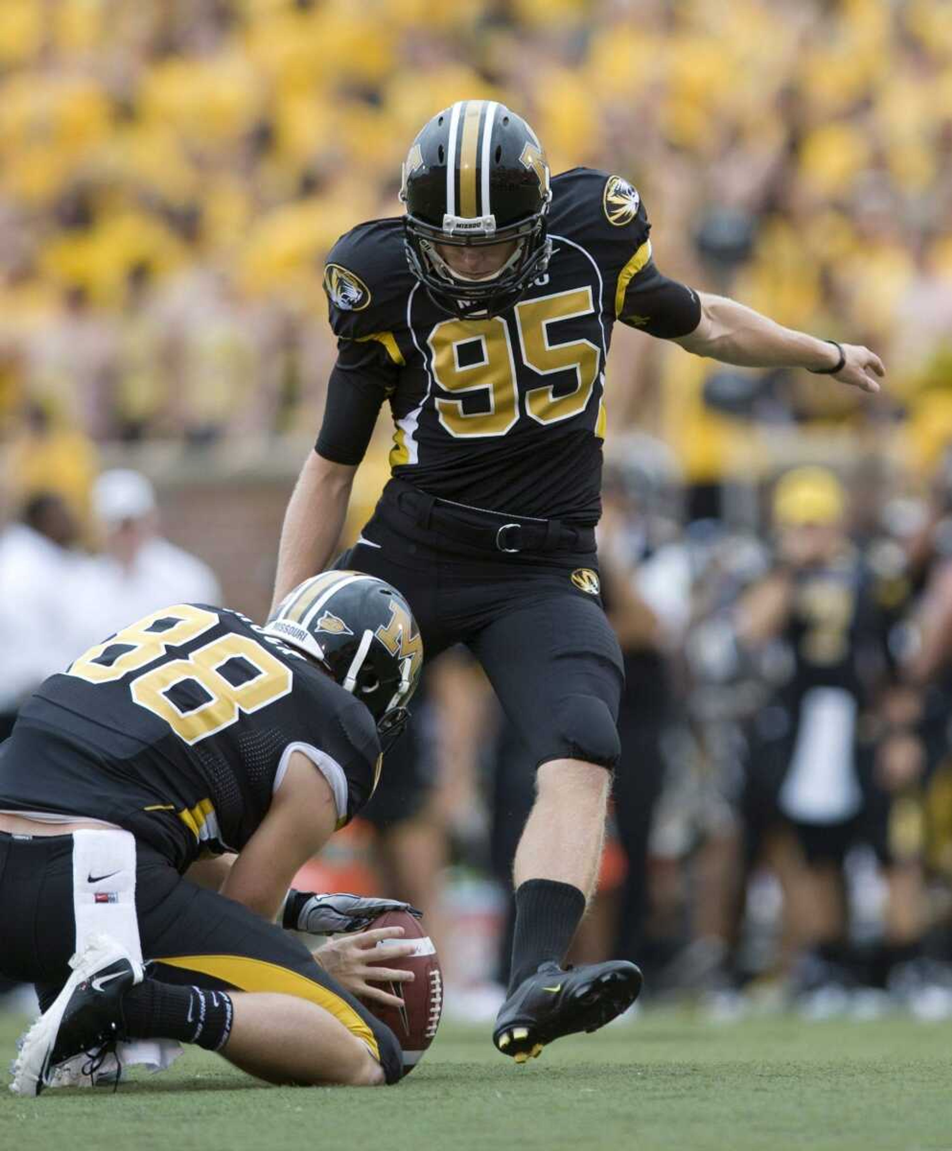 All-American place-kicker Grant Ressel boots an extra point for Missouri during a game last season in Columbia, Mo. Ressel, a former walk-on, is getting ready for his fourth season with the Tigers. (Associated Press file)